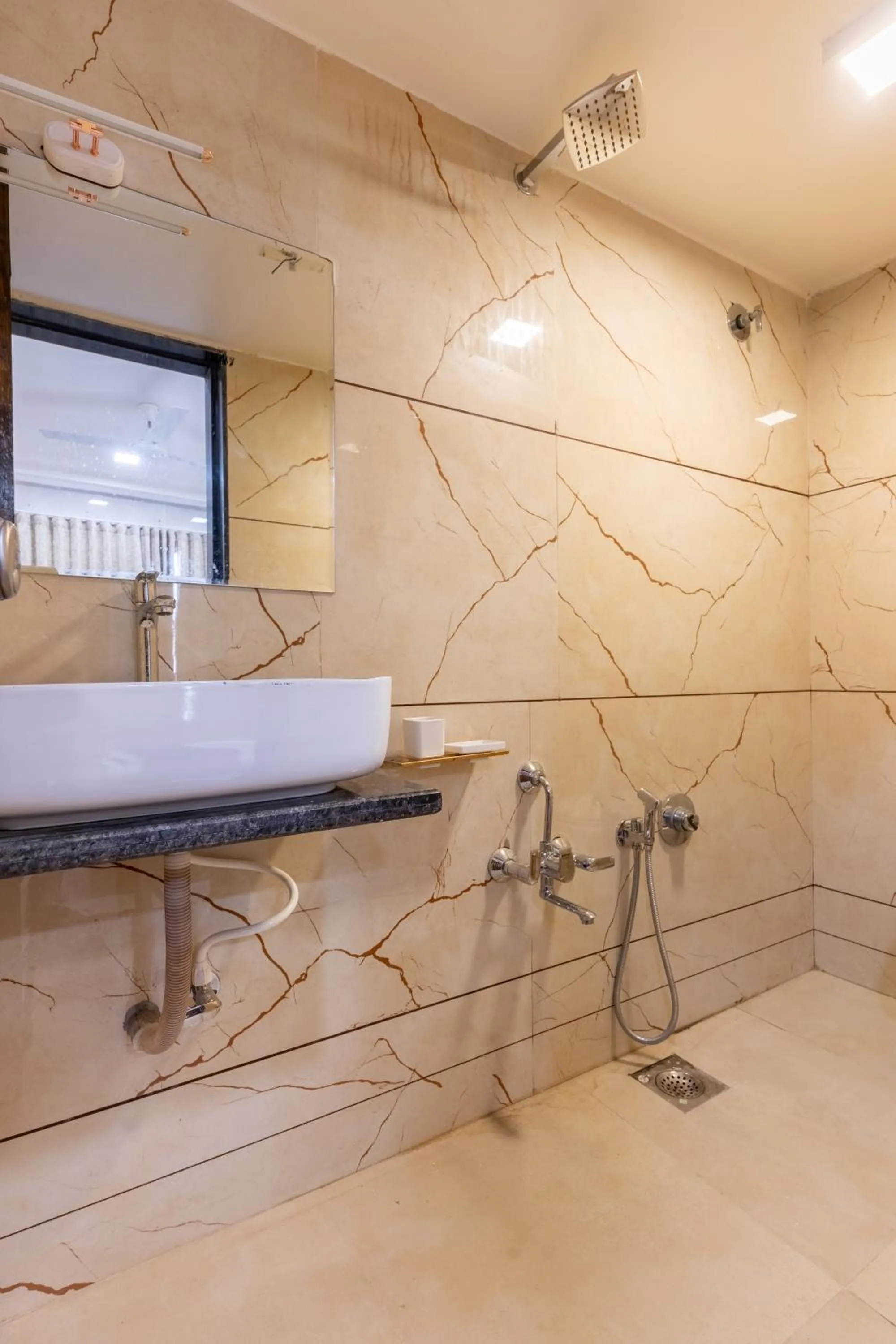 Shower in Hotel Noble Inn, Ahmedabad