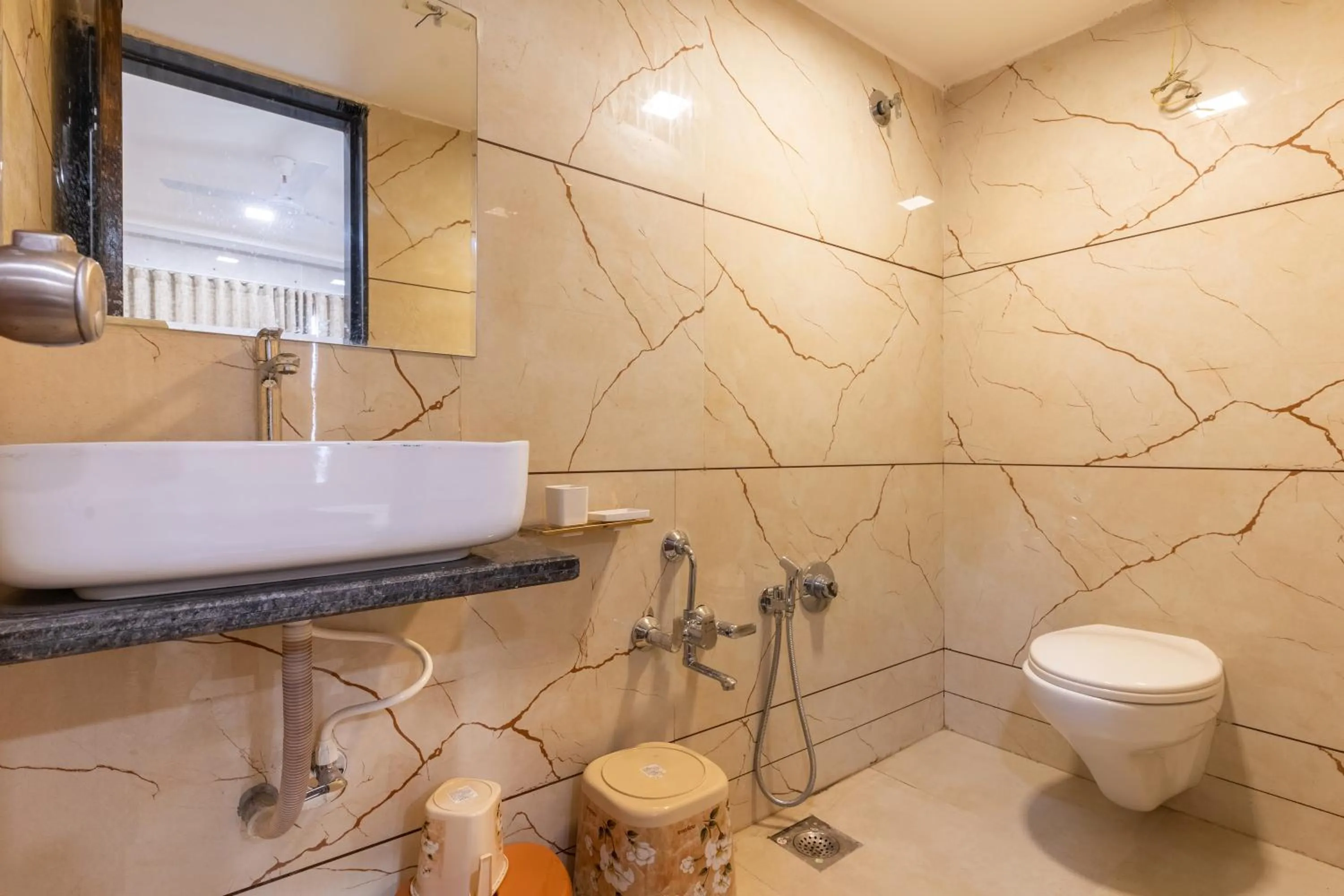 Shower in Hotel Noble Inn, Ahmedabad