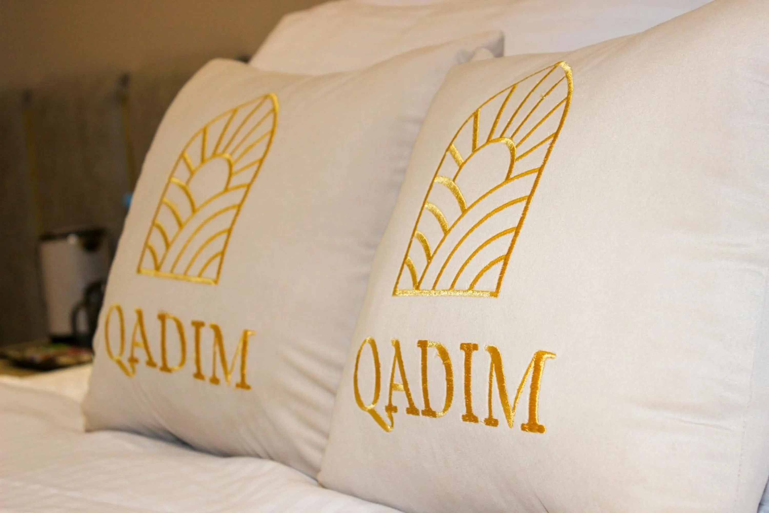 Text overlay, Bed in Qadim Hotel