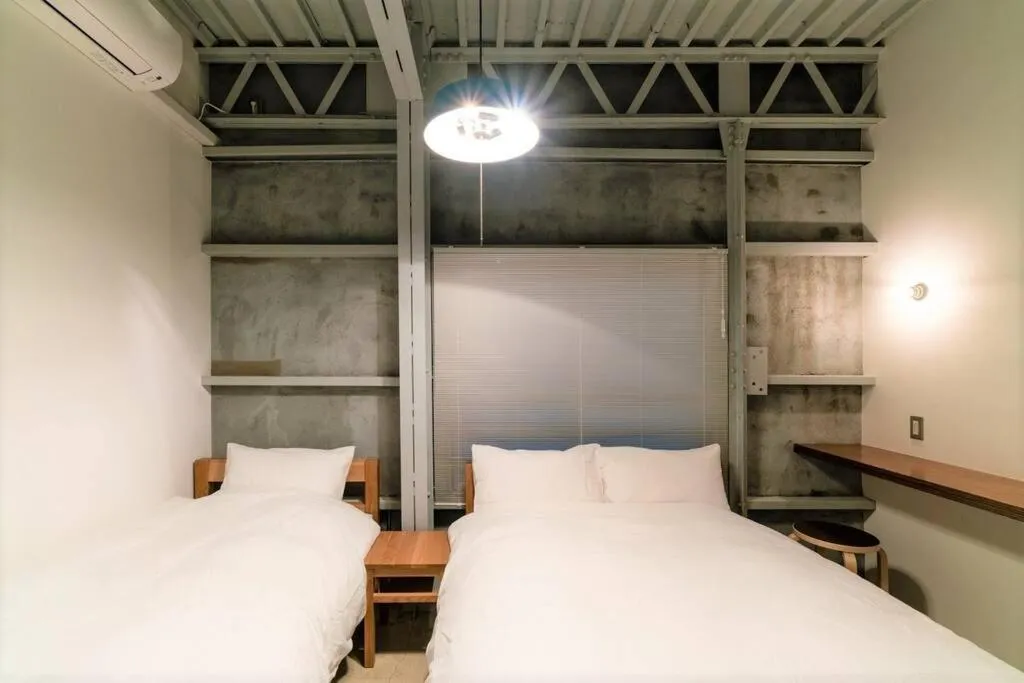 Bed in Rakuna Inn 遊 Kinshicho