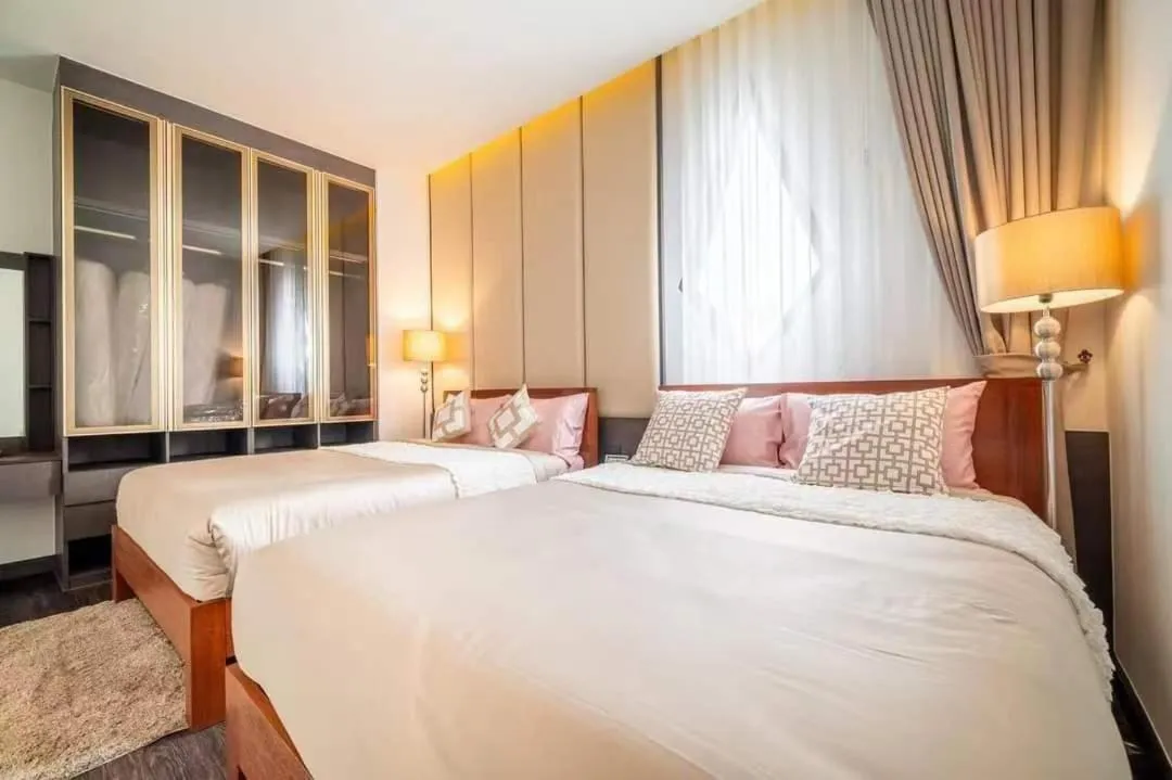 Bed in Moon 5-Bedroom Luxury Pool Villa