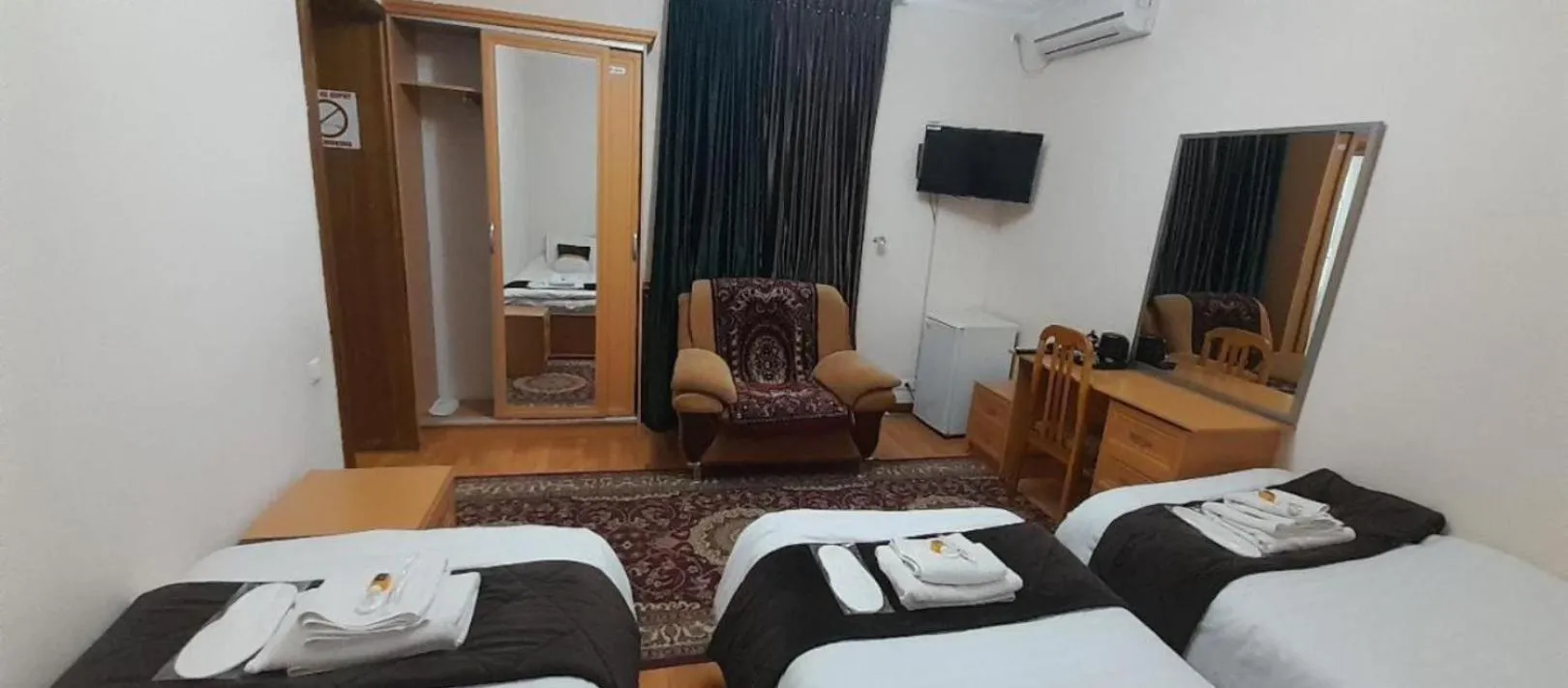 Bed in Marvarid Hotel