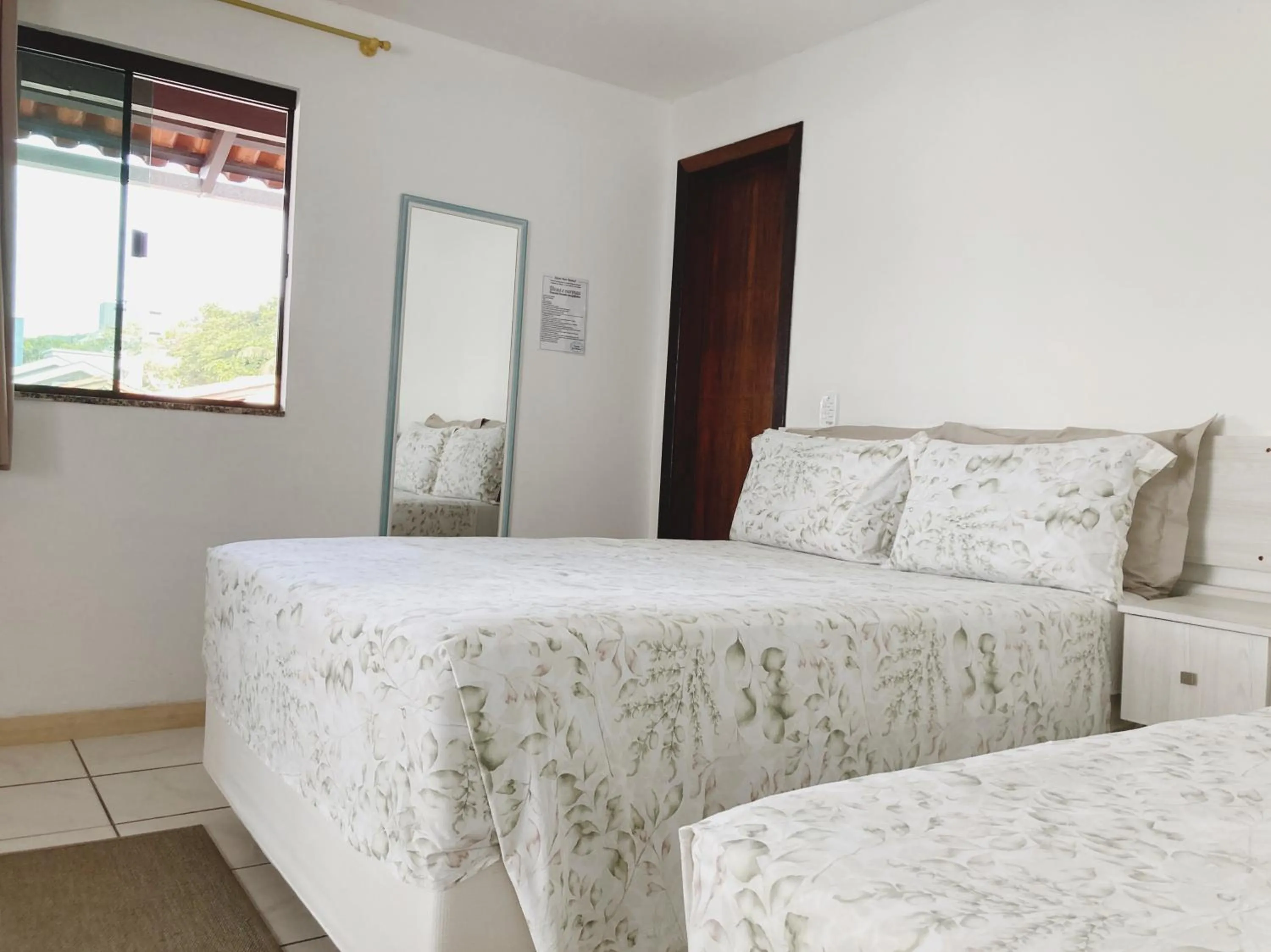 Bed in Pousada Enseada dos Golfinhos