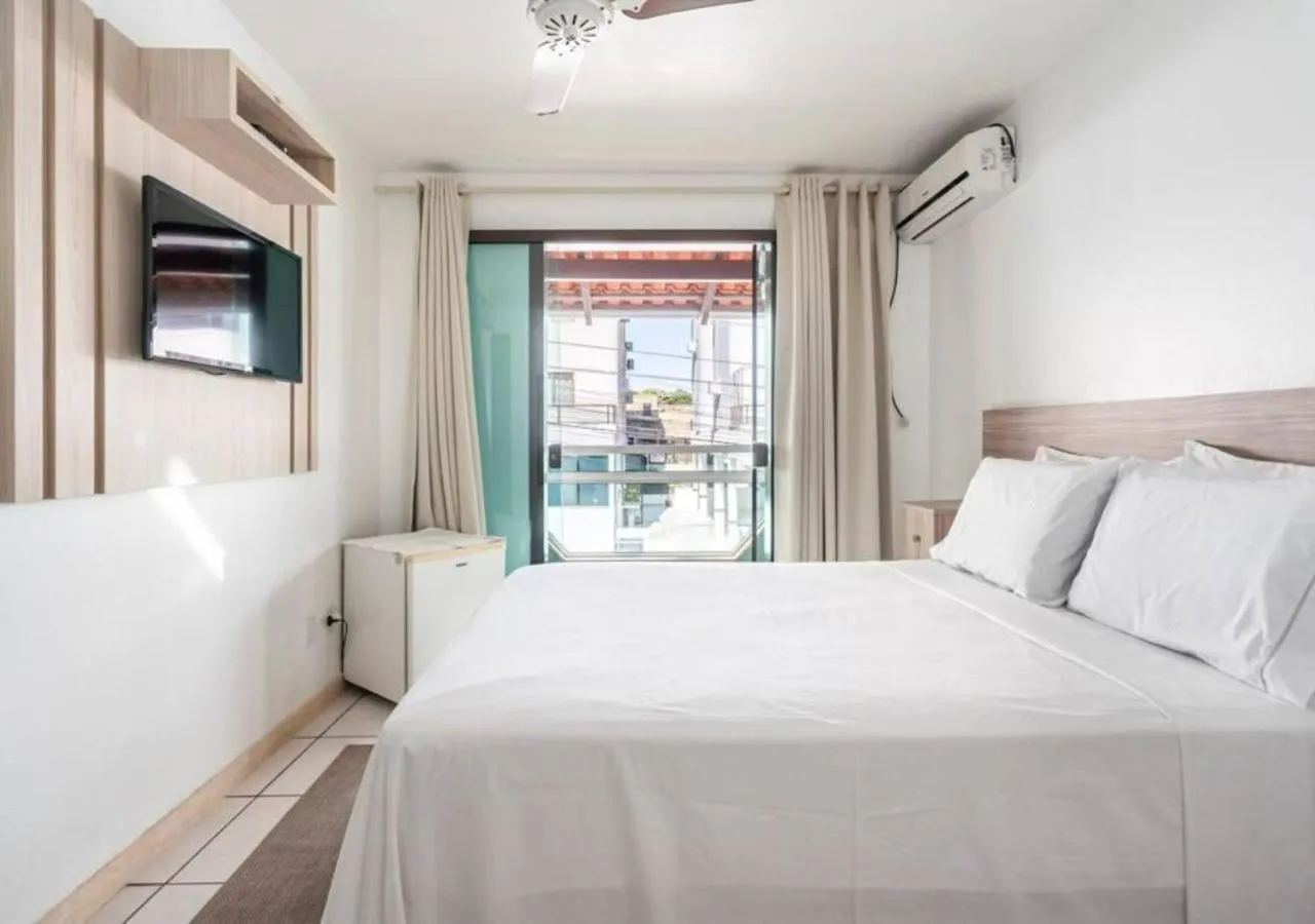 Bed in Pousada Enseada dos Golfinhos