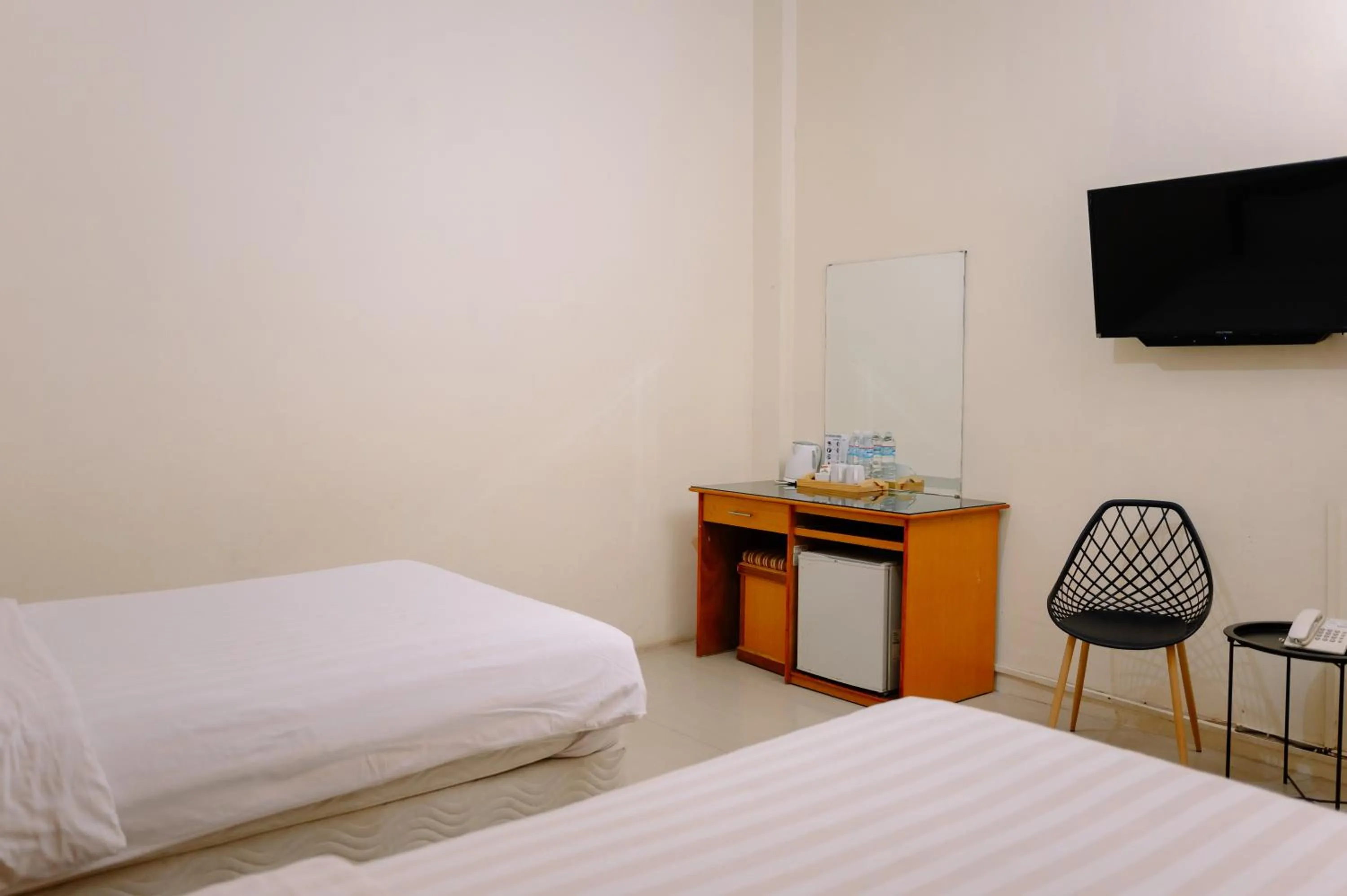 Bed in Kartika Sriwijaya Hotel