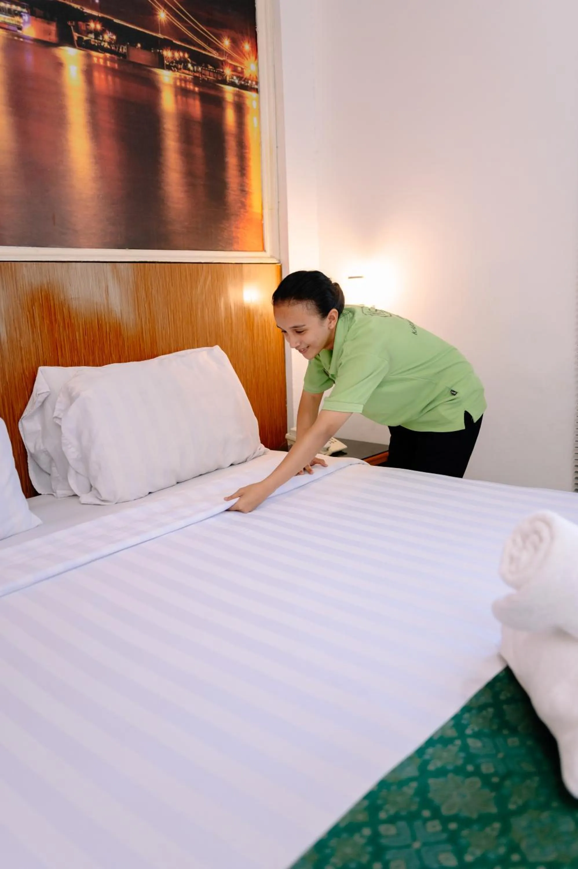 Bed in Kartika Sriwijaya Hotel