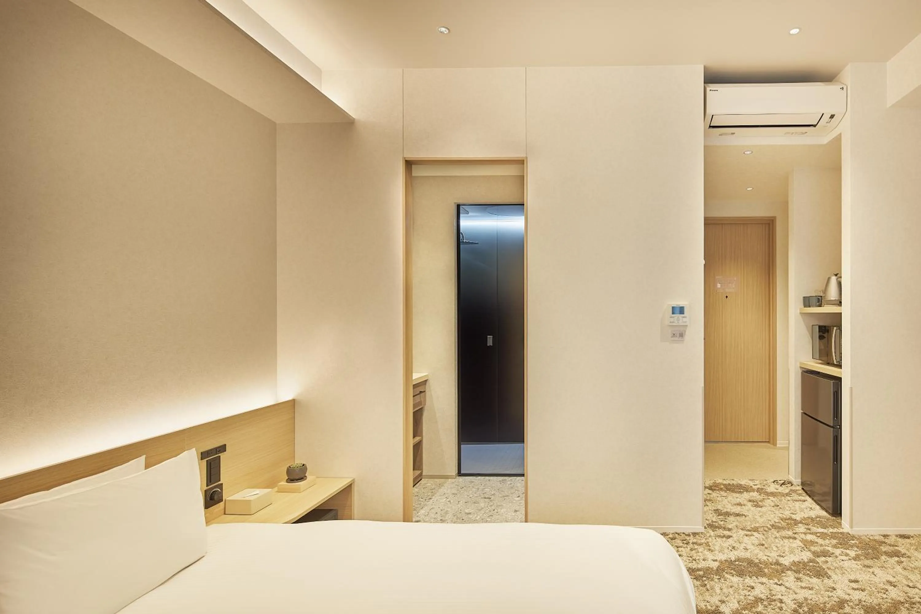 Photo of the whole room, Bed in FAV LUX Kagoshima Tenmonkan