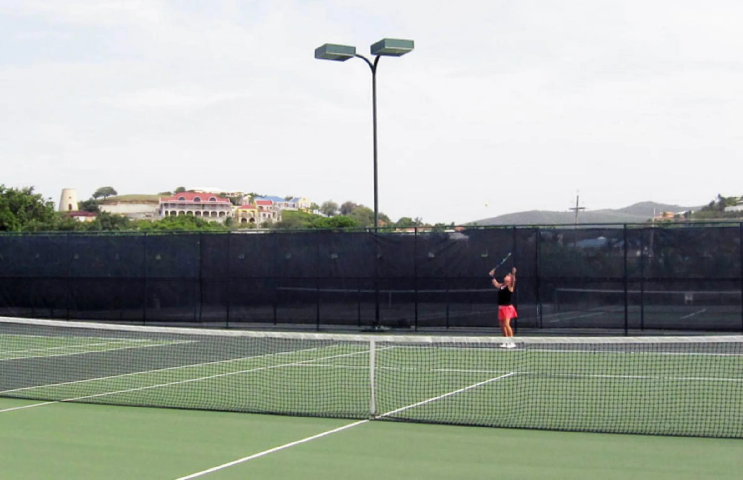 Tennis court in Tamarind Reef Resort Spa & Marina