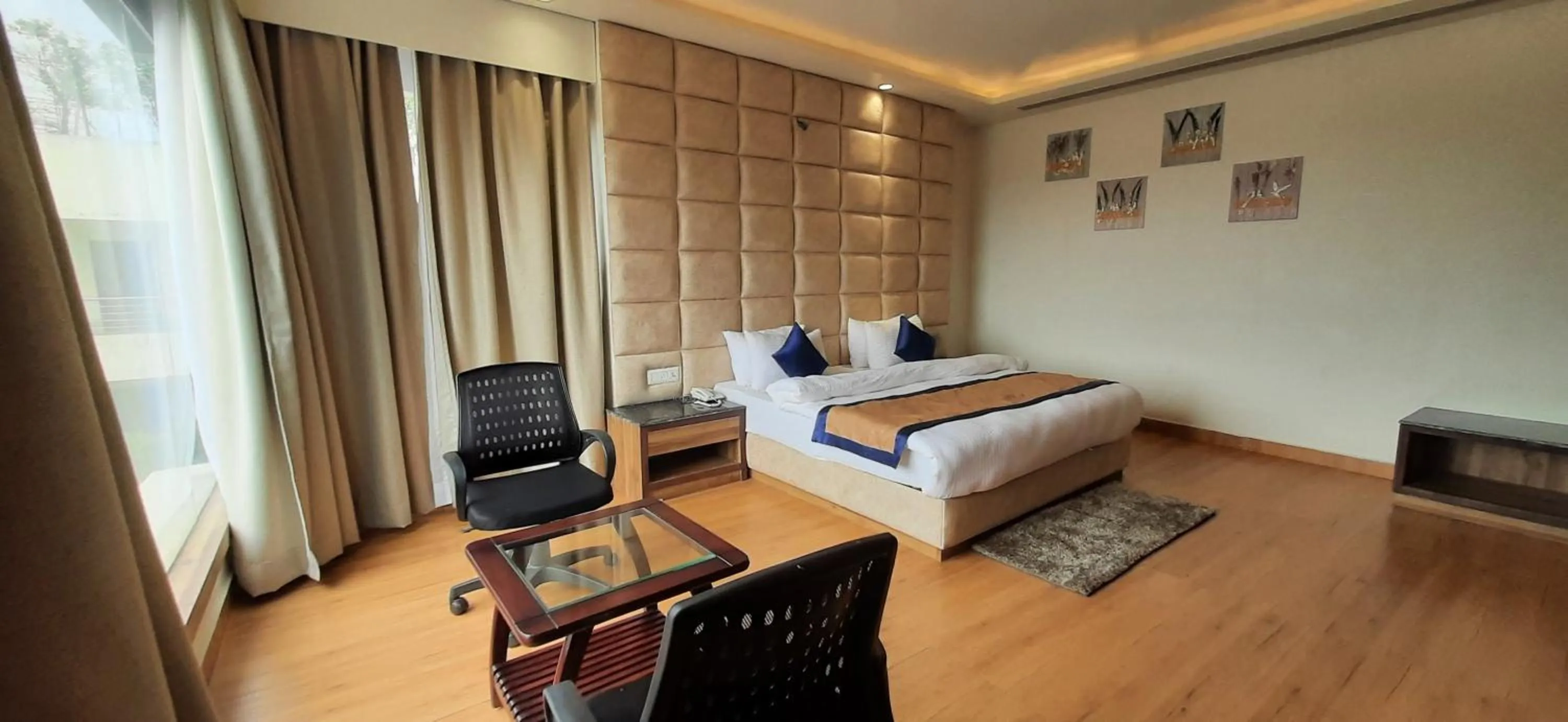Bed in Sparsh Hotel & Resort