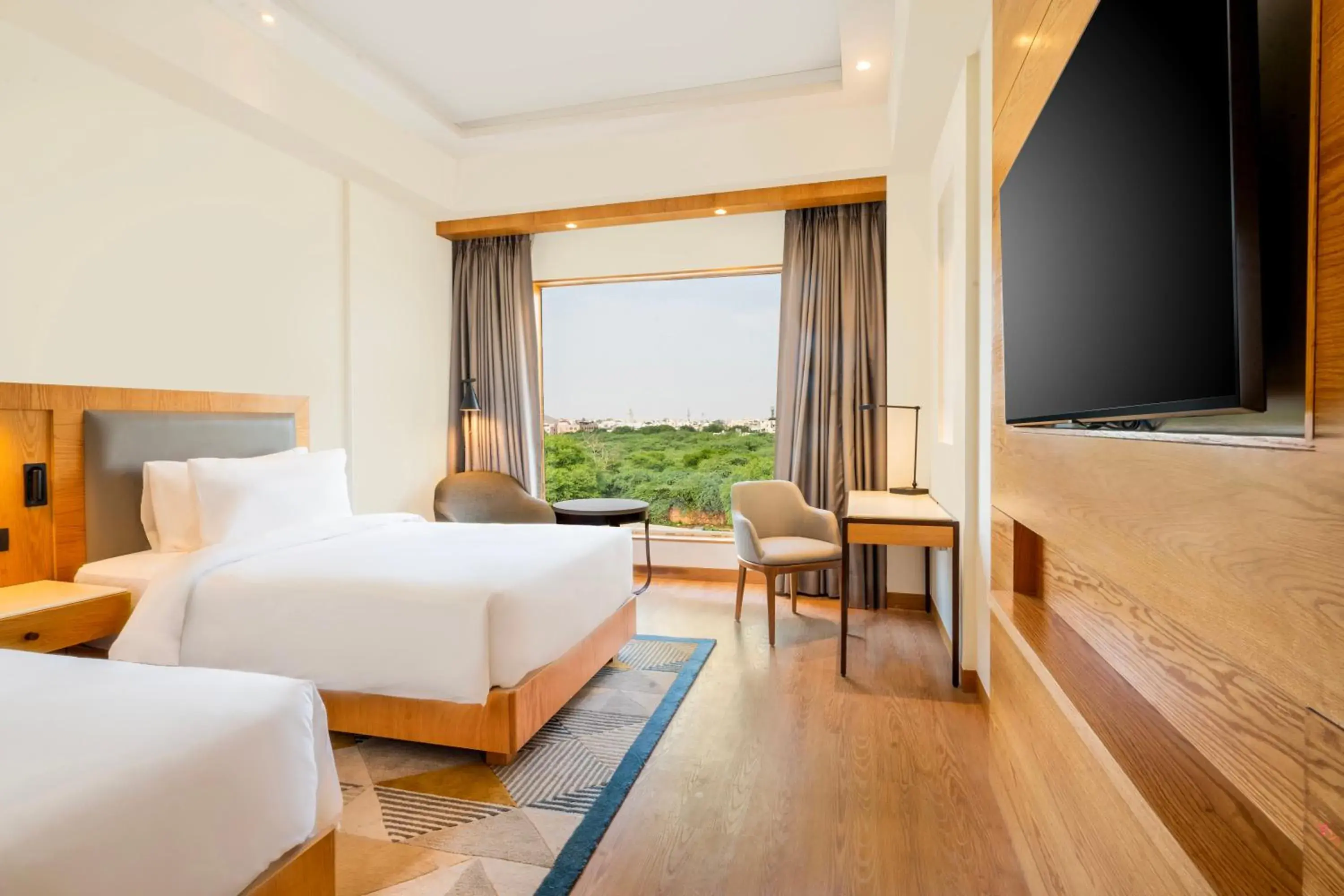 View (from property/room), Bed in Radisson Hotel Vrindavan View (from property/room), Bed in Radisson Hotel Vrindavan