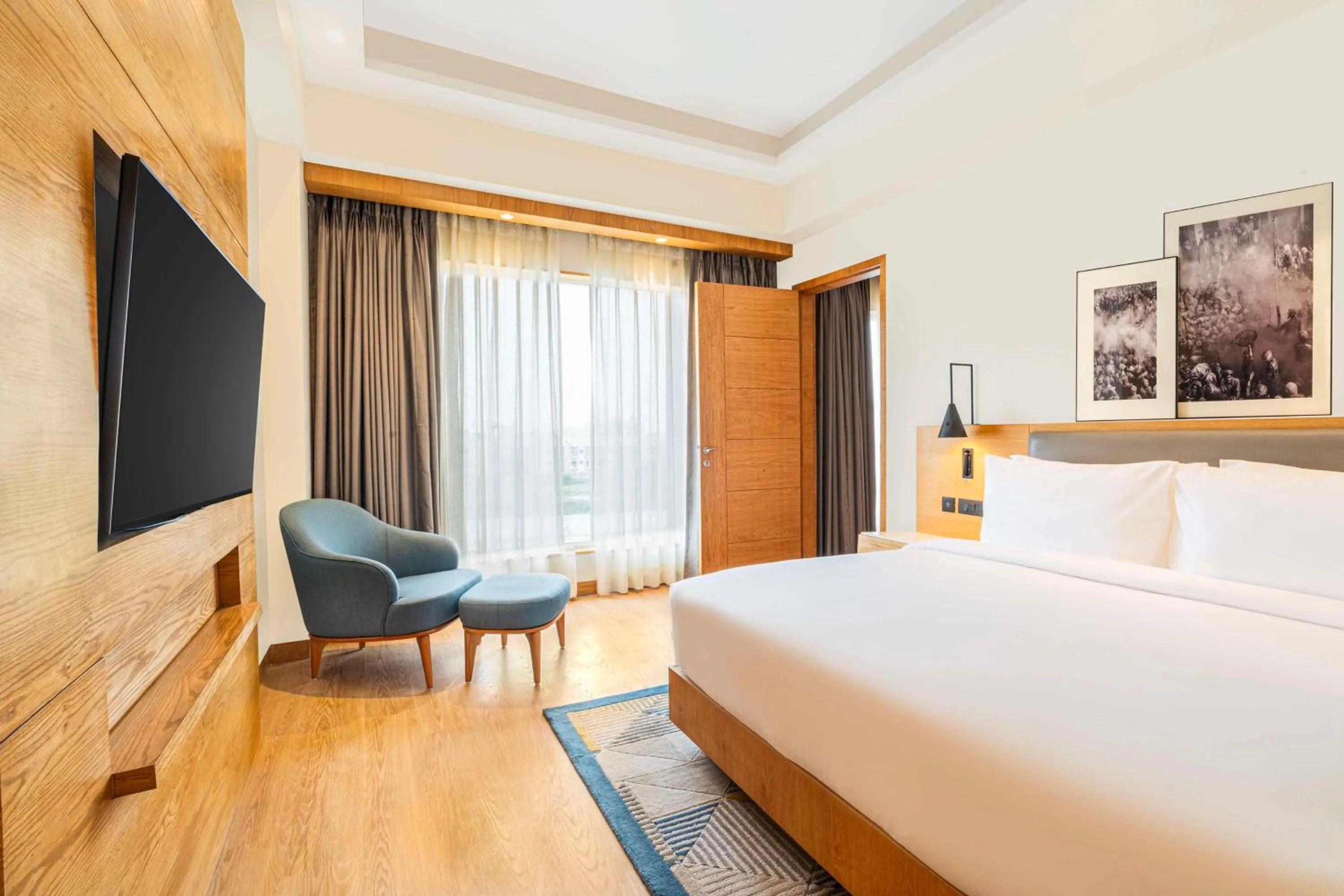 Photo of the whole room, Bed in Radisson Hotel Vrindavan