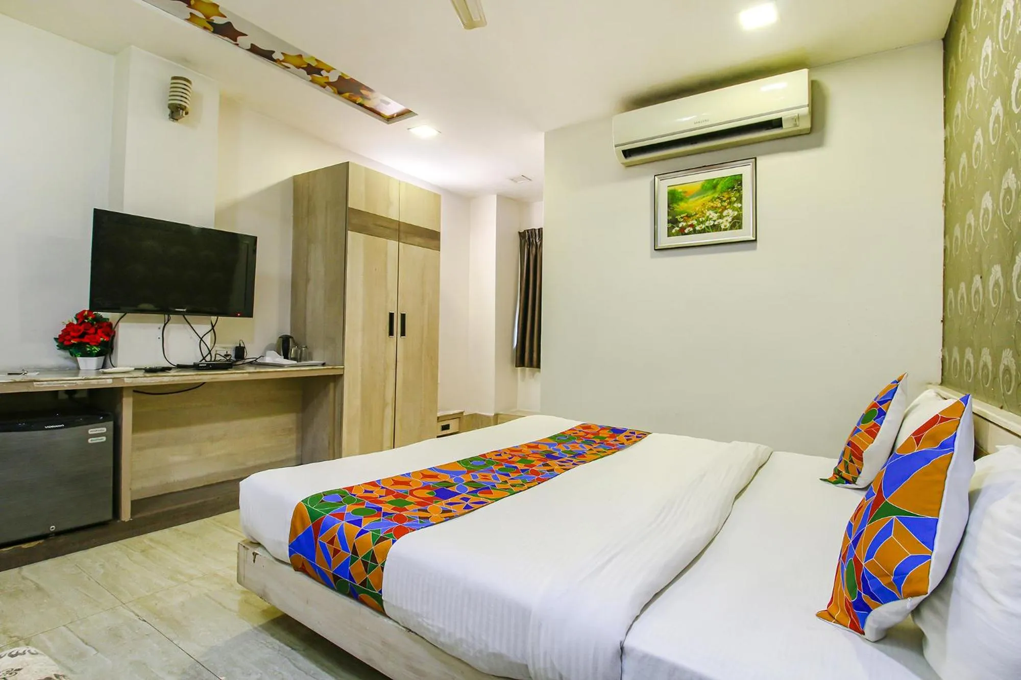 Bed in FabHotel Smriti Star