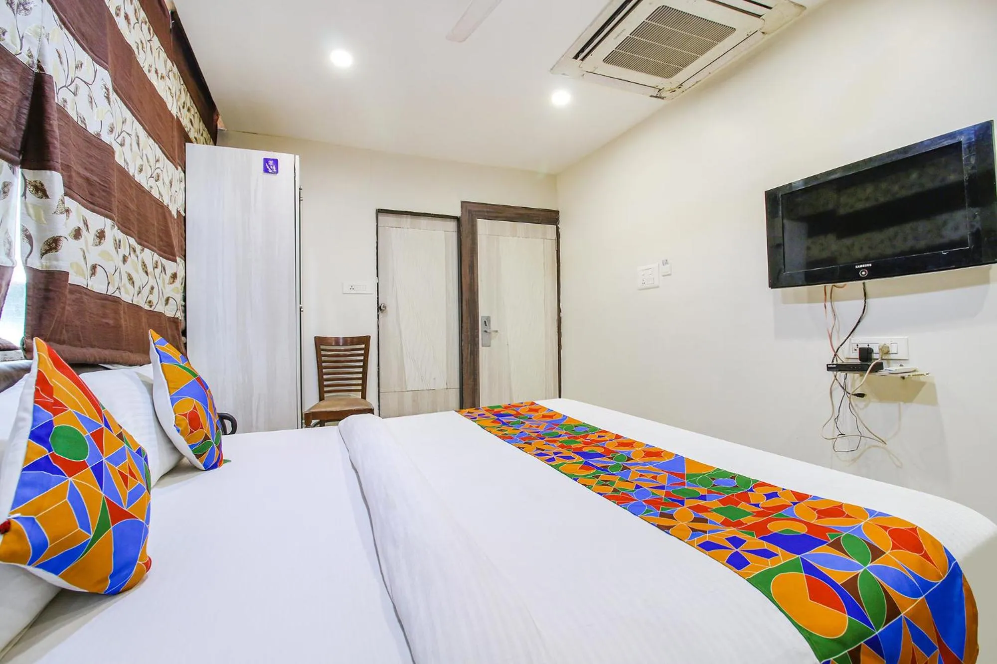Bed in FabHotel Smriti Star