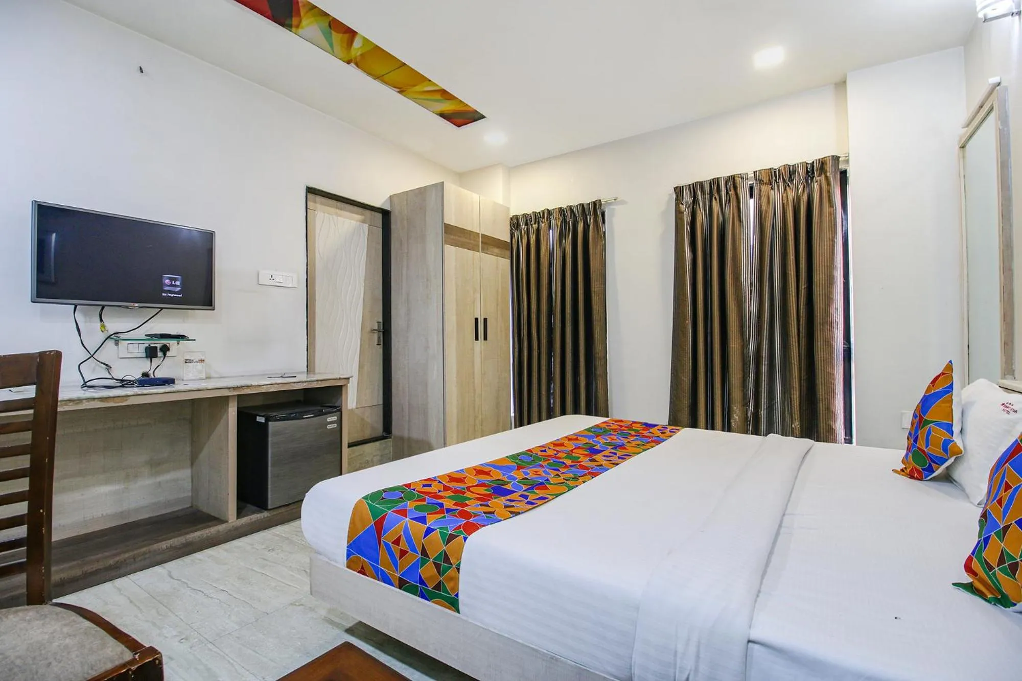 Bed in FabHotel Smriti Star