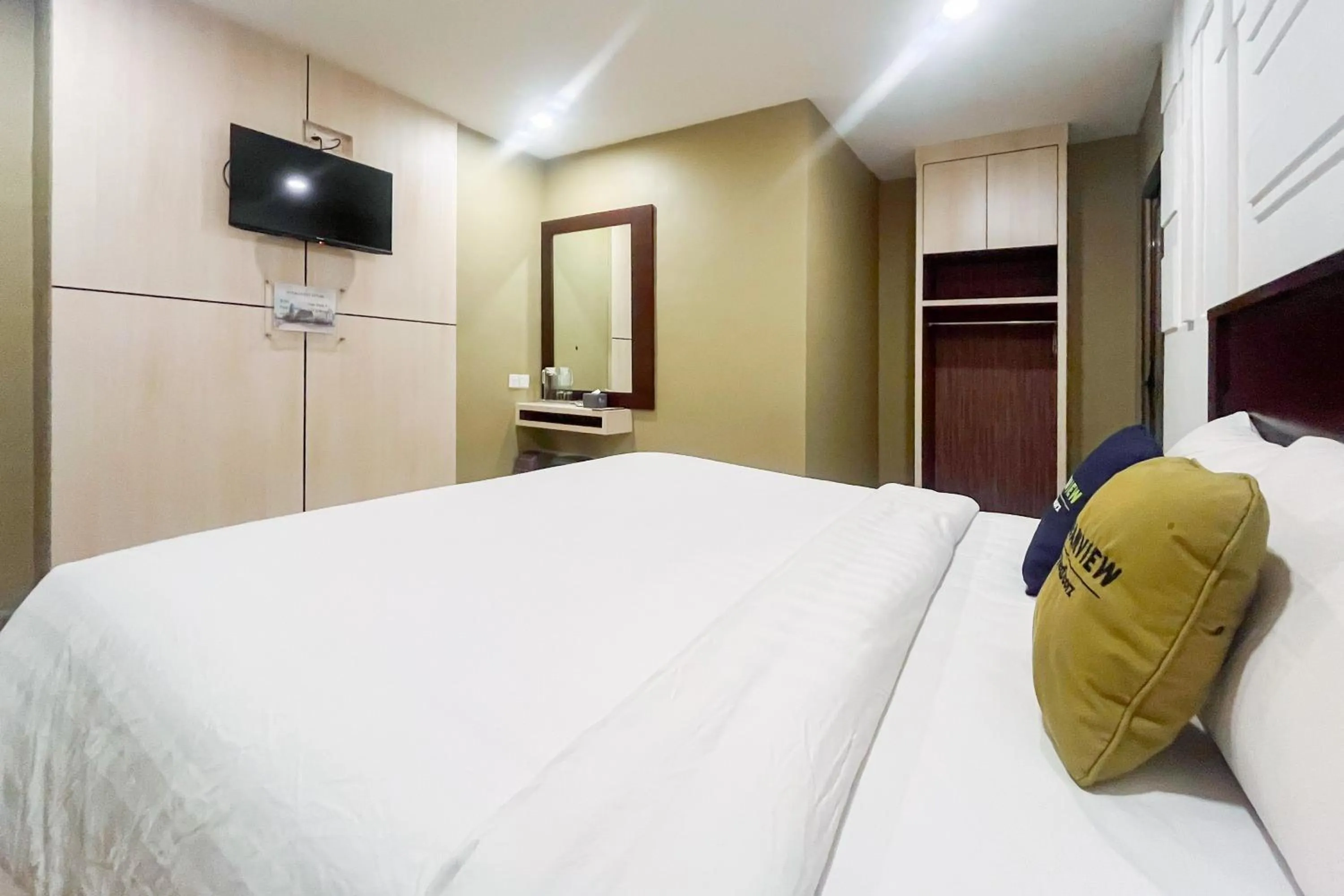 Bedroom, Bed in Urbanview Hotel X Ten Harbour Bay Batam