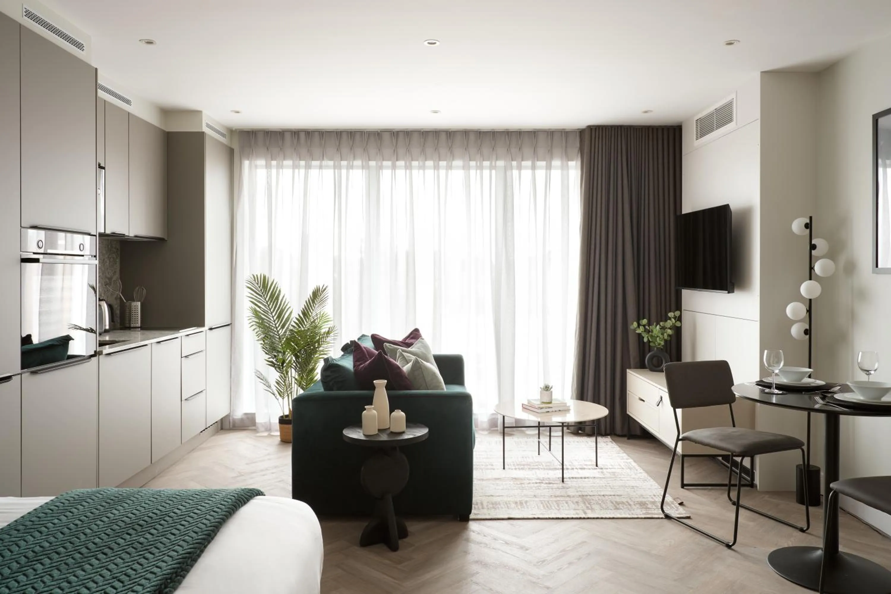 Seating area, Bed in London City East by Viridian Apartments