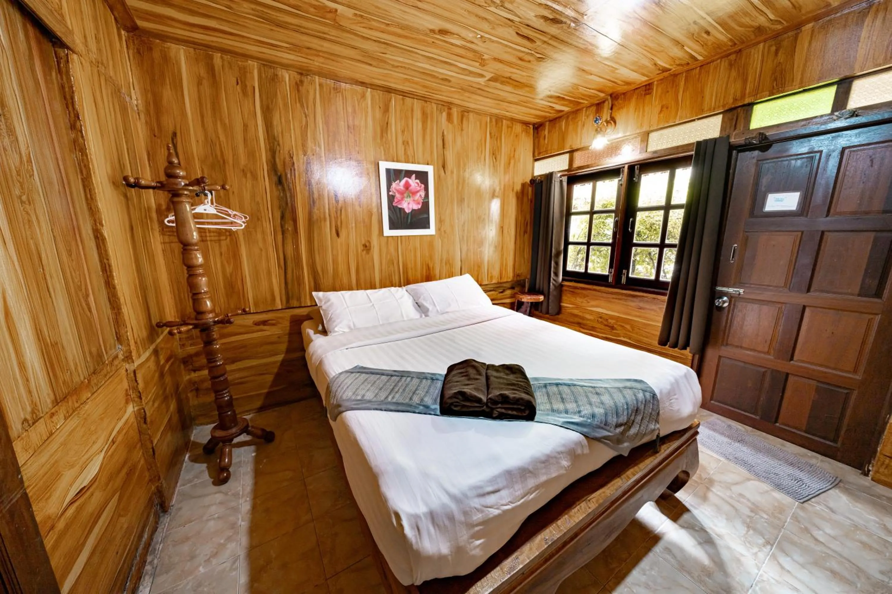 Bed in Athithara Homestay