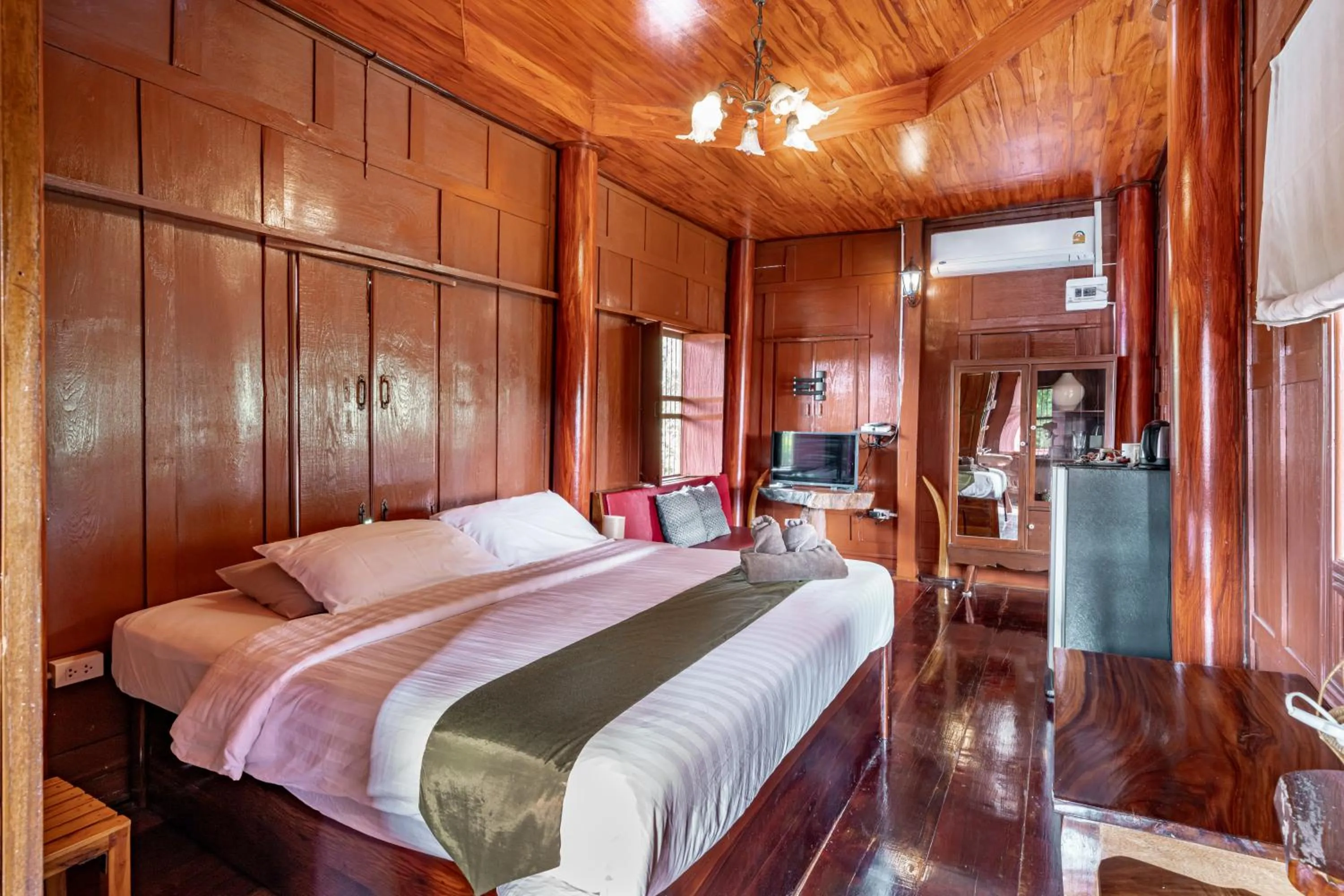 Bed in Athithara Homestay