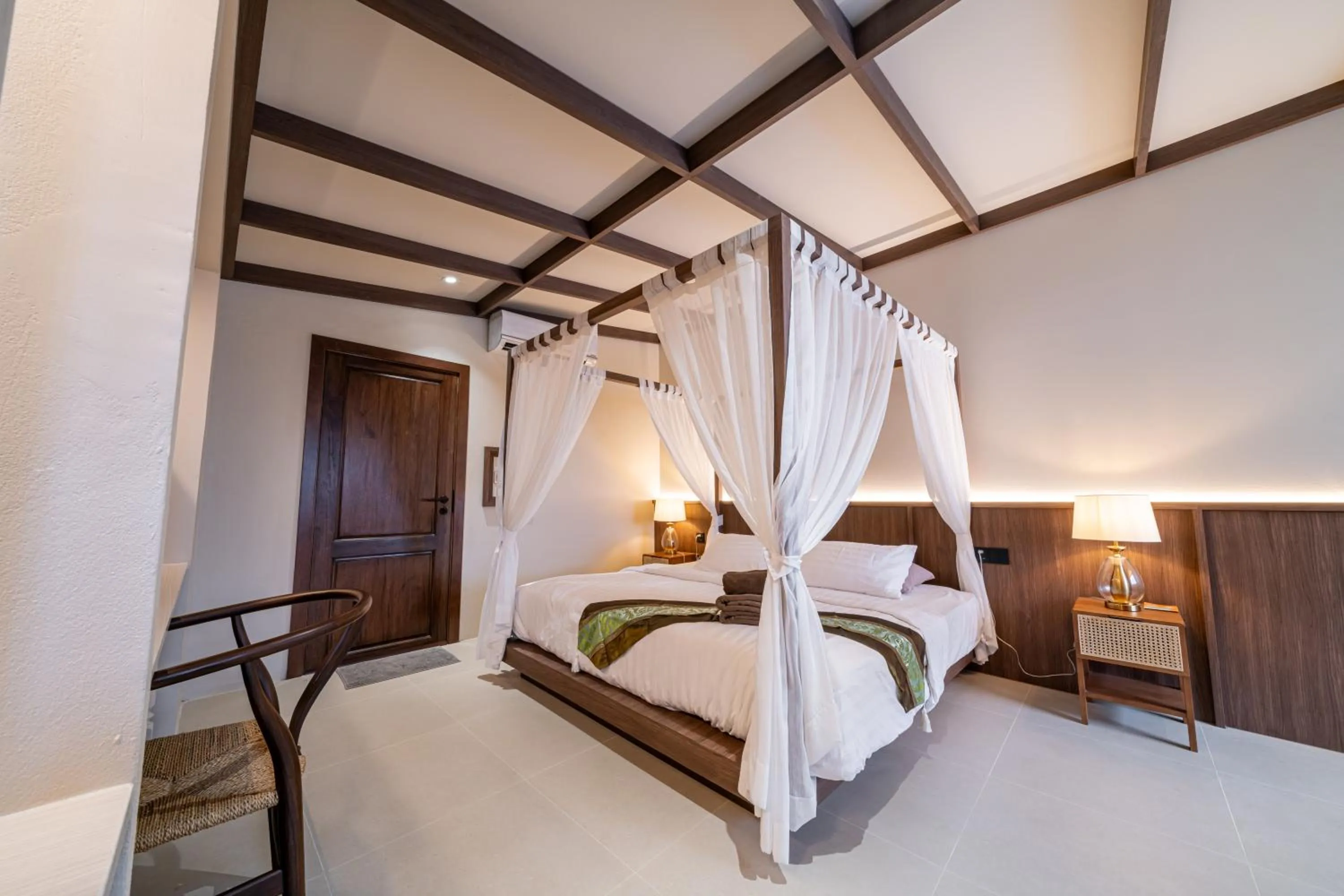 Bed in Athithara Homestay