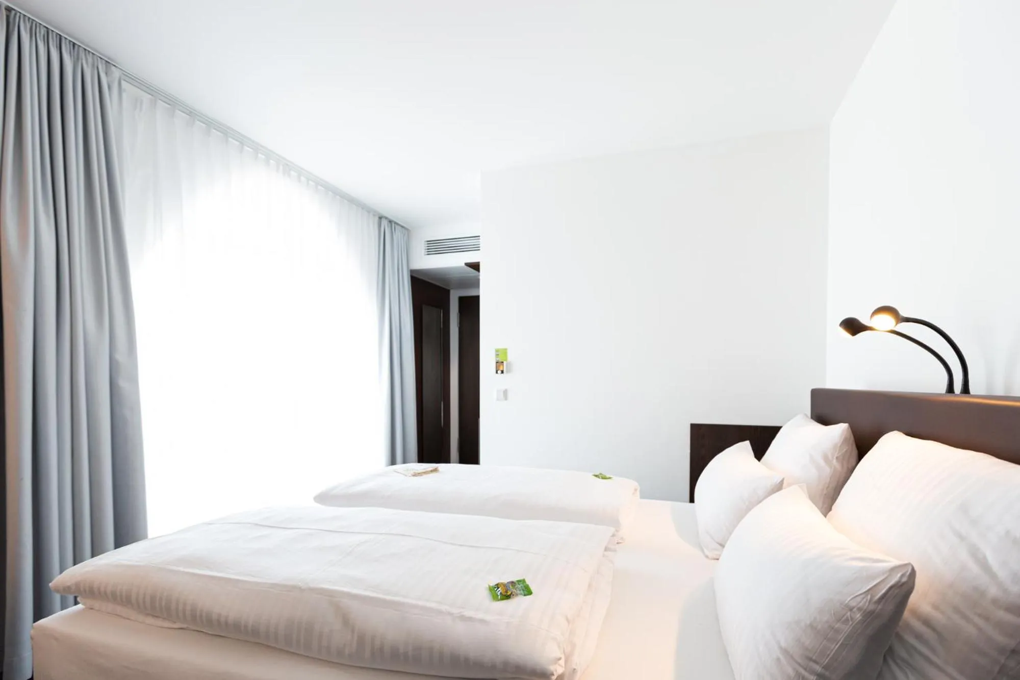 Photo of the whole room, Bed in Tobbaccon Hotel