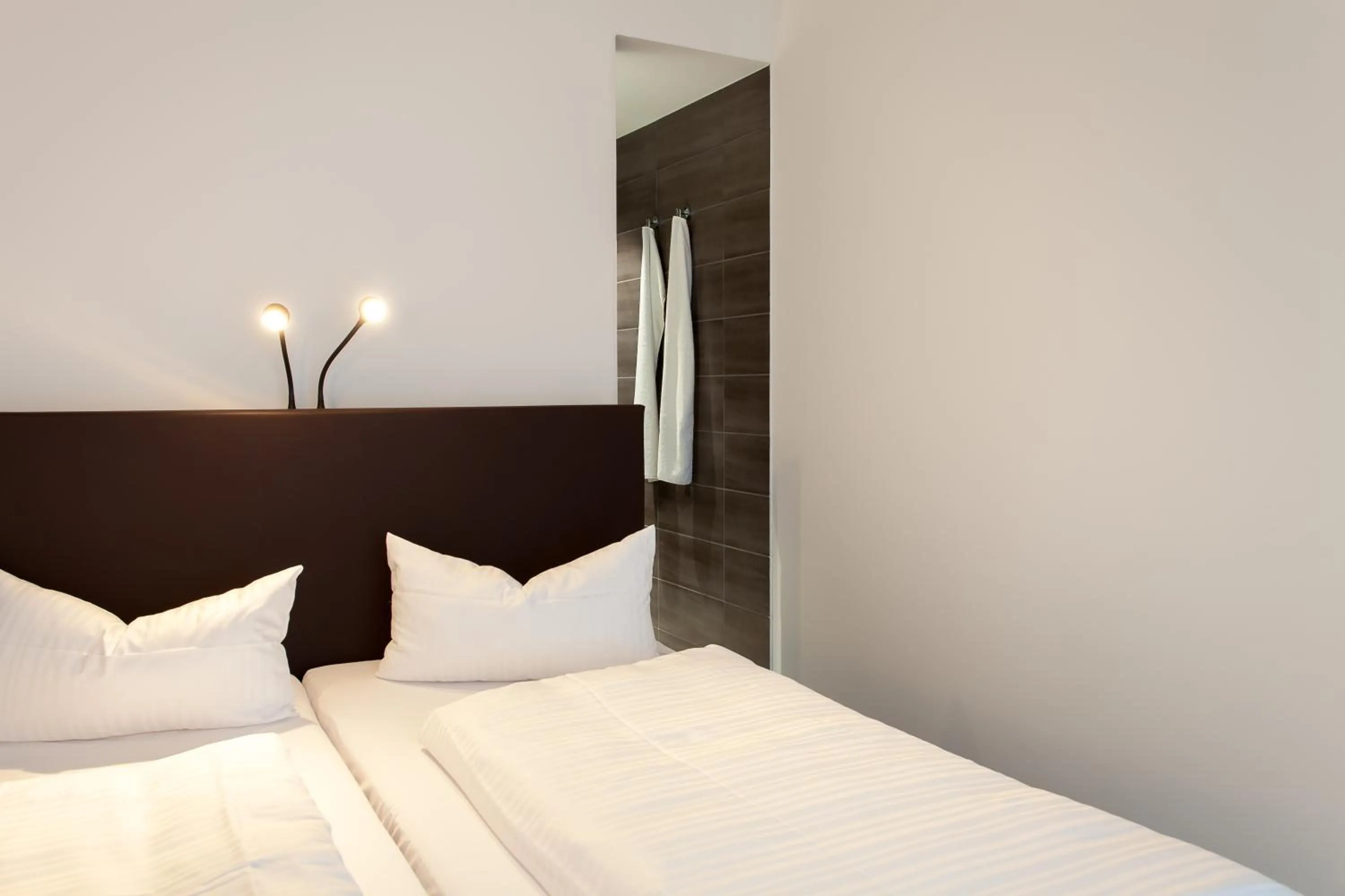 Bed in Tobbaccon Hotel