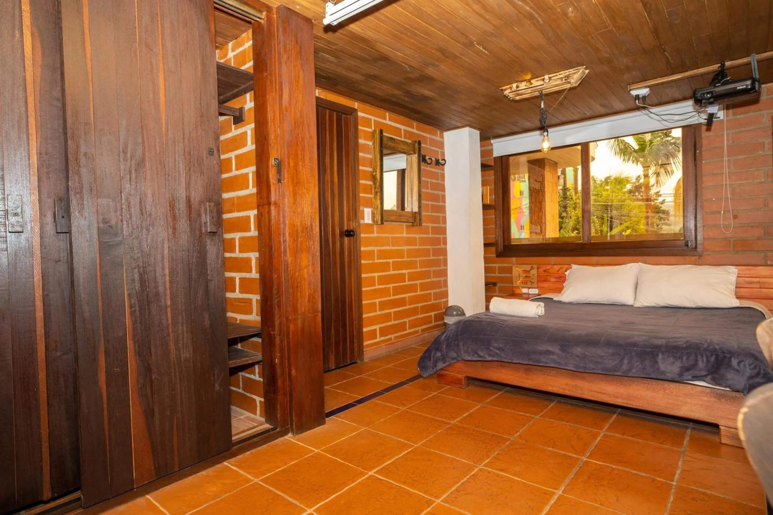 Bed in Hotel Spa Bliss Guatape