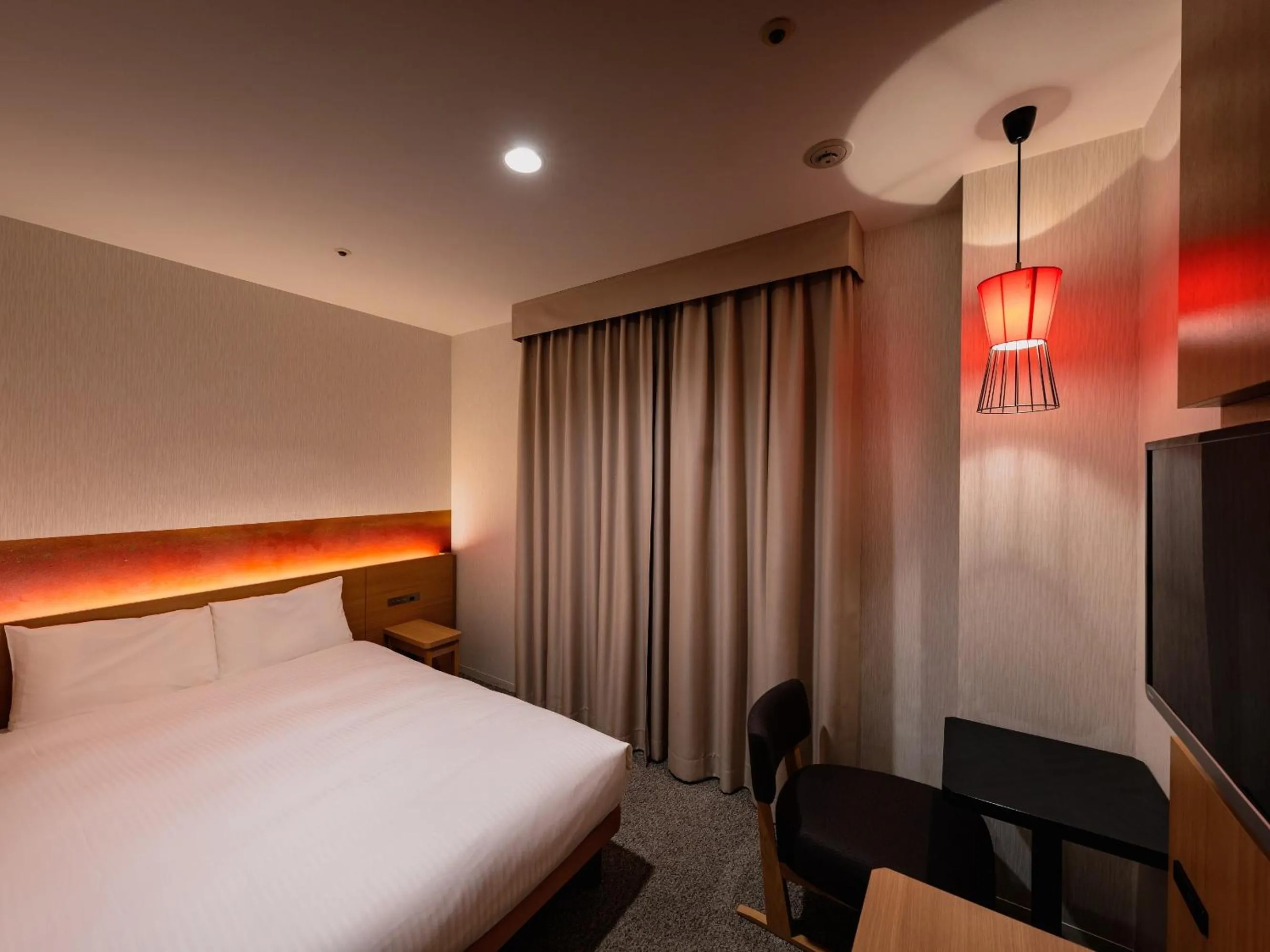 Bed in Loisir Hotel Classic Garden Kyoto Sanjo