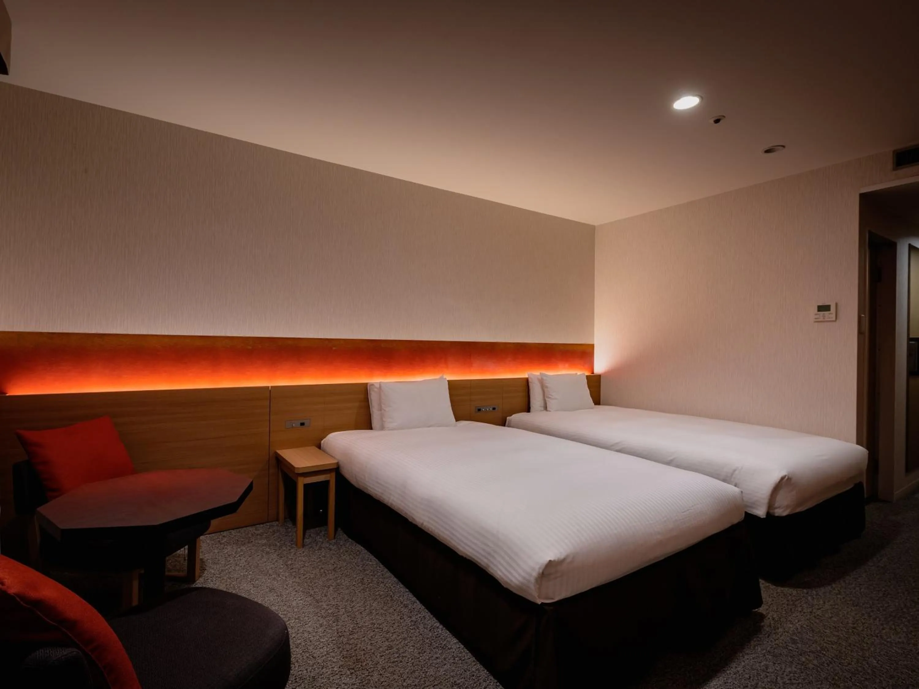 Bed in Loisir Hotel Classic Garden Kyoto Sanjo