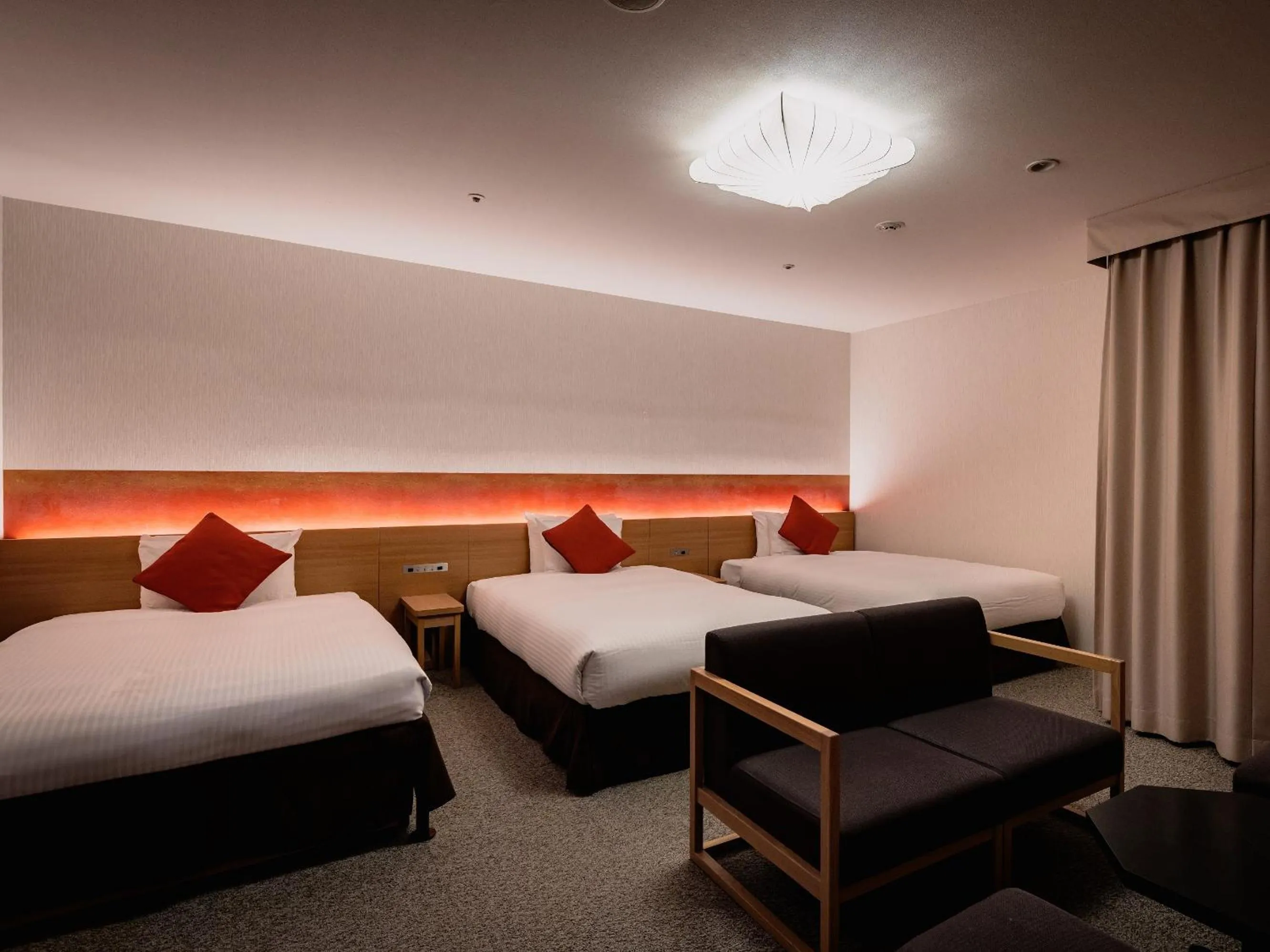 Bed in Loisir Hotel Classic Garden Kyoto Sanjo