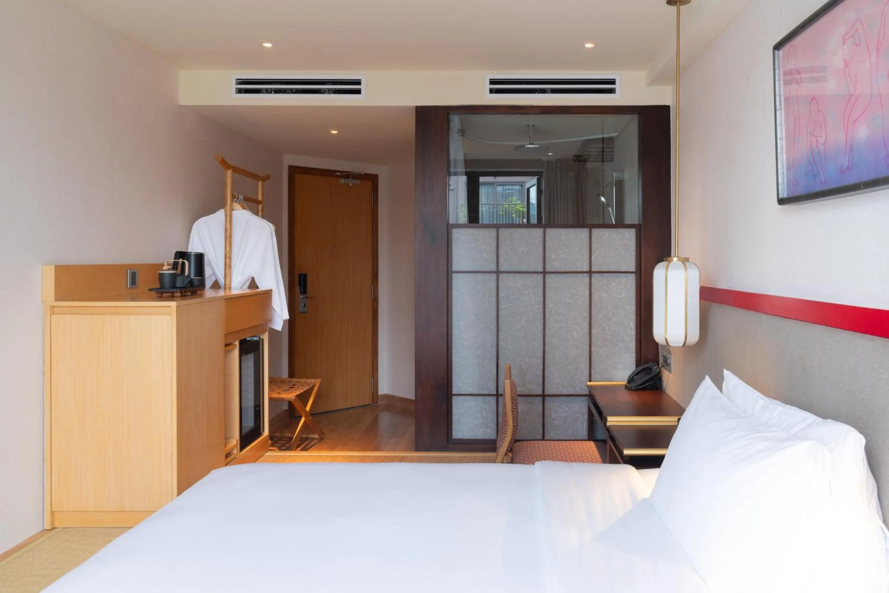 Bed in Suzu Saigon - A Boutique Hotel
