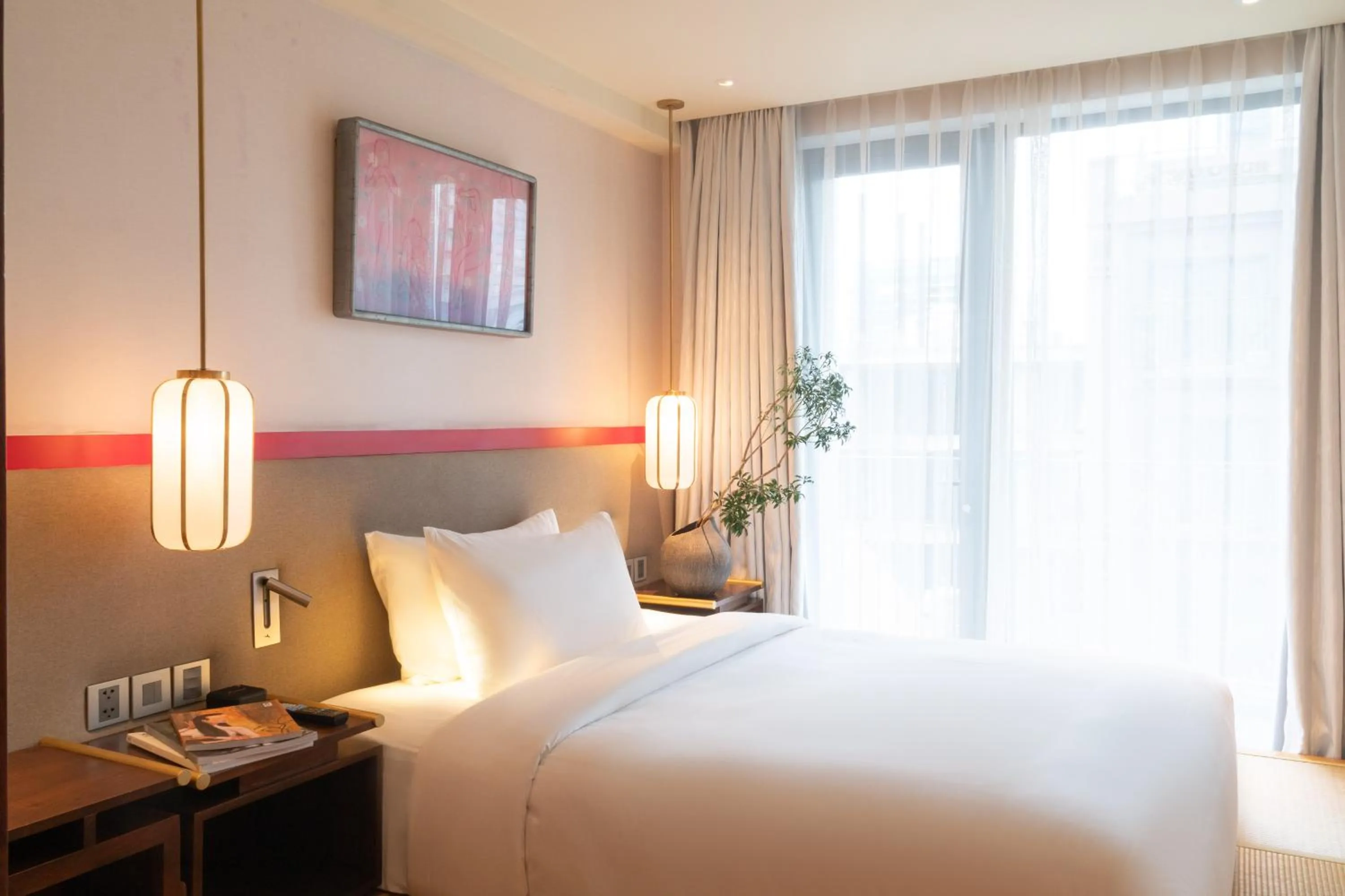Bed in Suzu Saigon - A Boutique Hotel