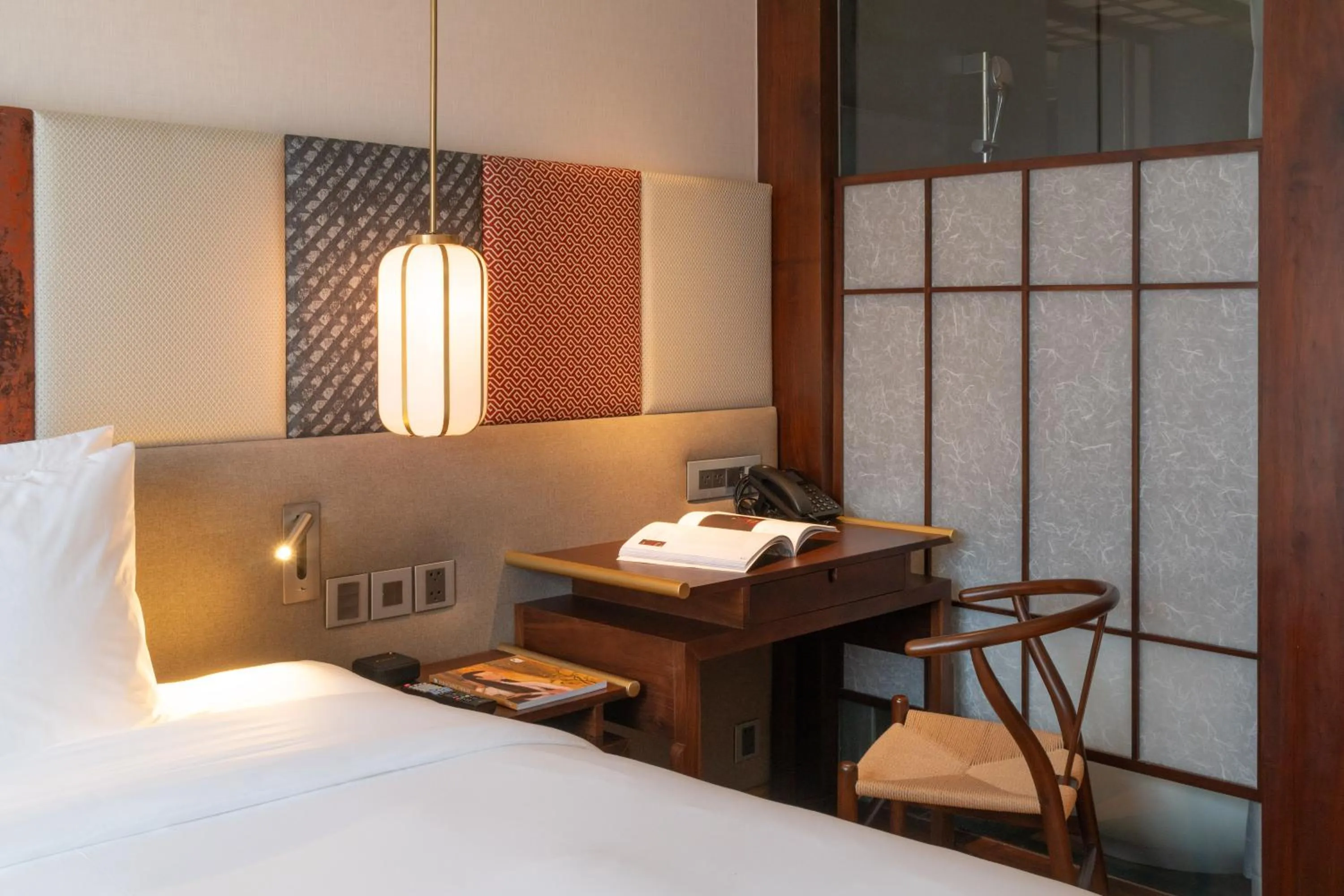 Bed in Suzu Saigon - A Boutique Hotel
