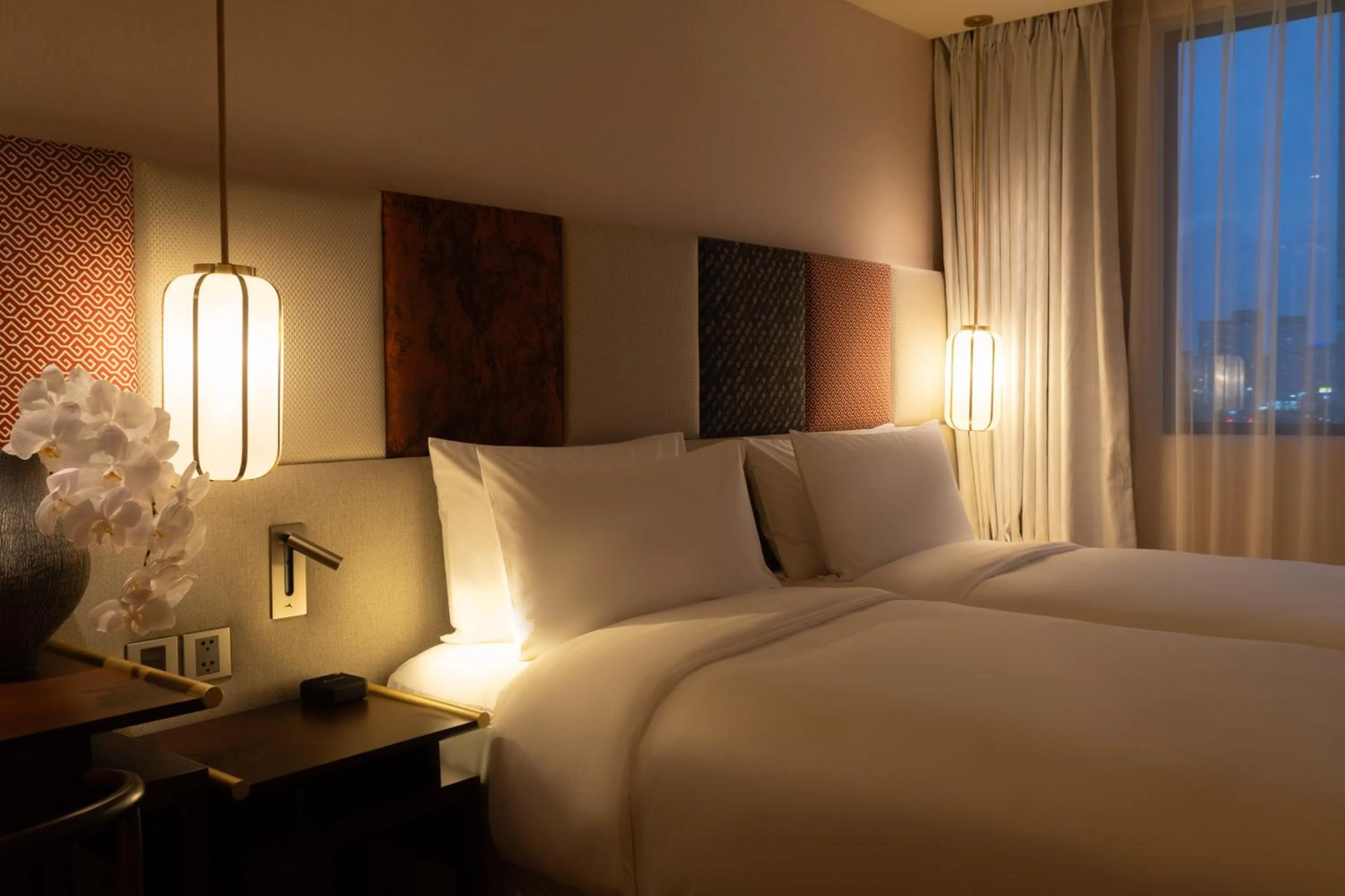 Bed in Suzu Saigon - A Boutique Hotel