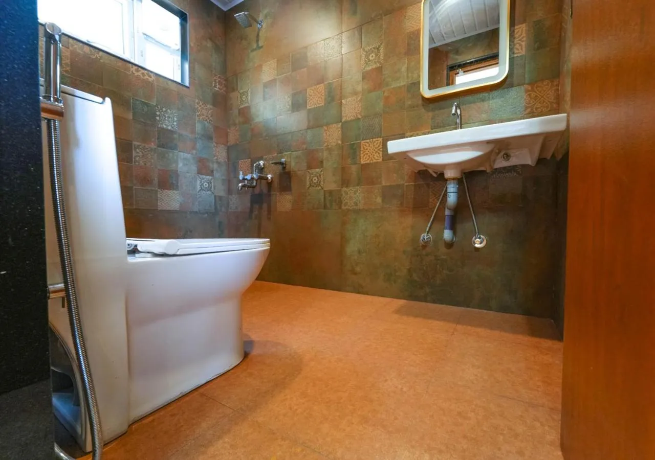 Shower in Silent Retreat Ooty Pool Resort by VOYE HOMES