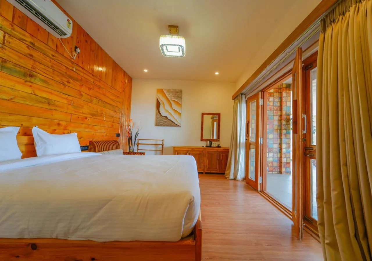 Bed in Silent Retreat Ooty Pool Resort by VOYE HOMES