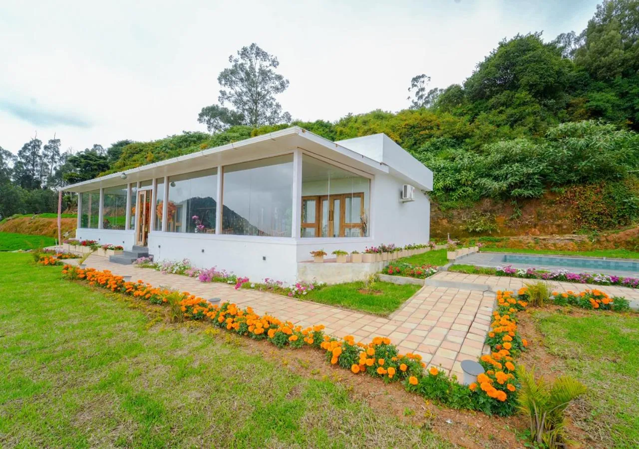 Property building in Silent Retreat Ooty Pool Resort by VOYE HOMES