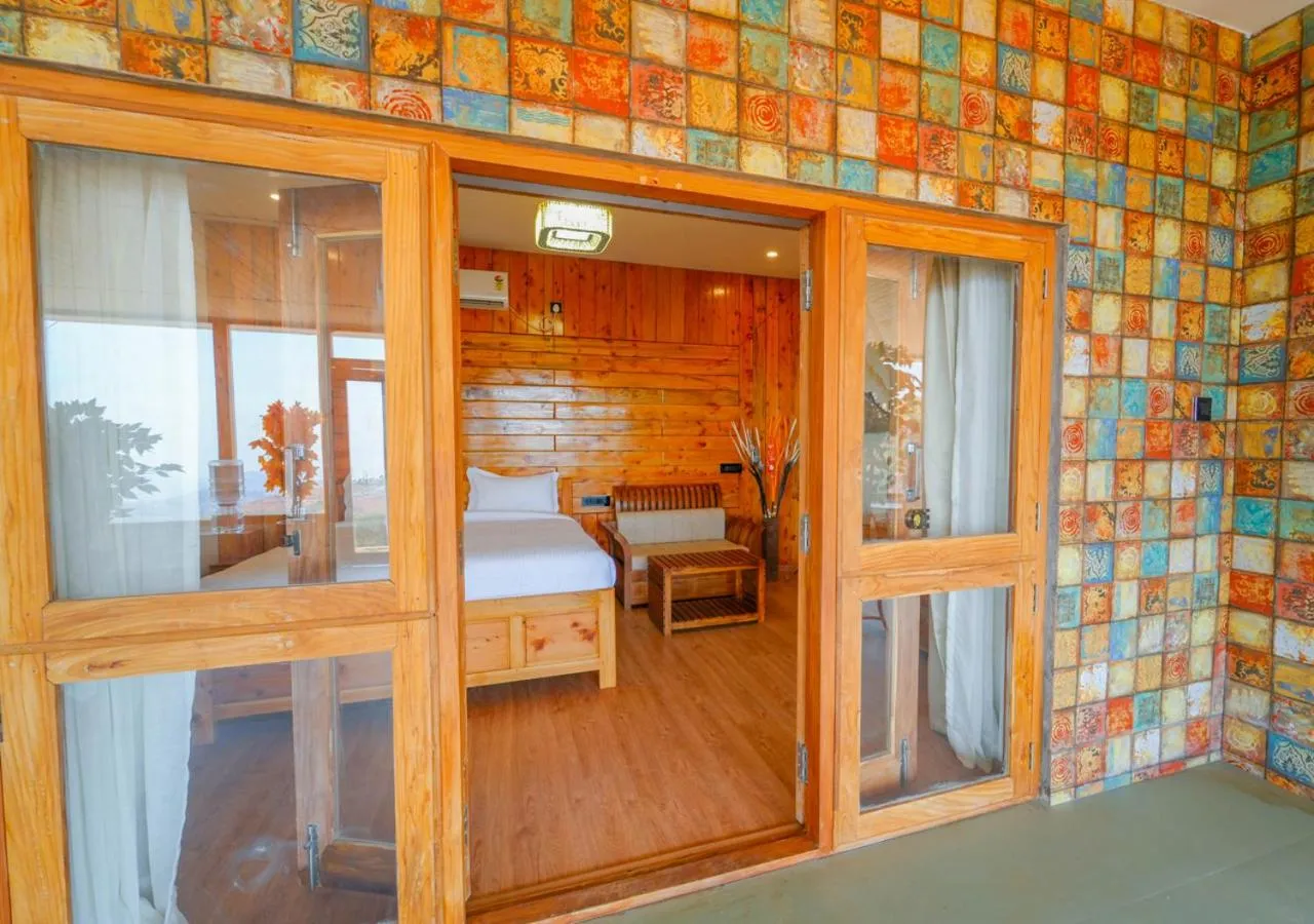 Bed in Silent Retreat Ooty Pool Resort by VOYE HOMES