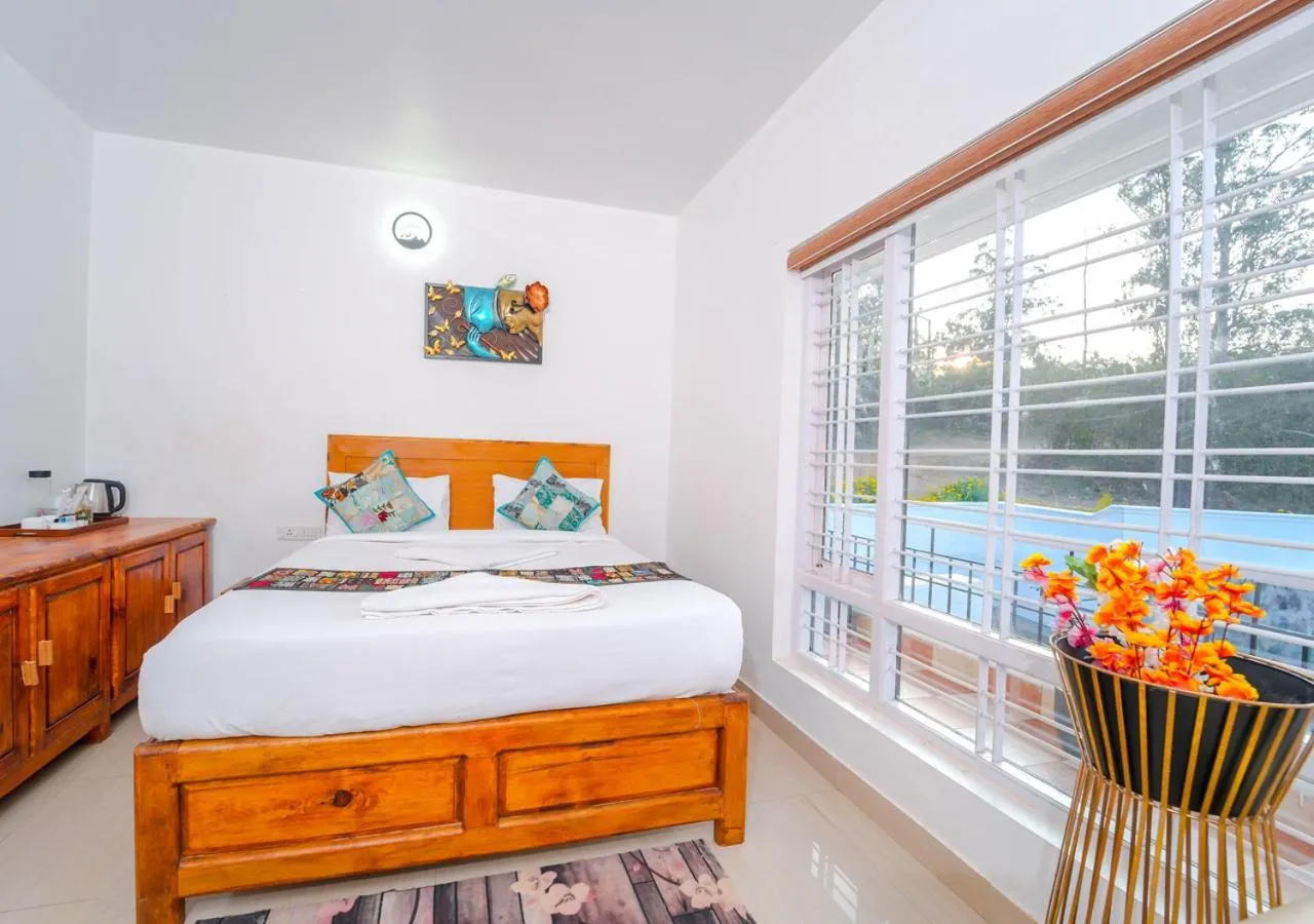 Bed in Silent Retreat Ooty Pool Resort by VOYE HOMES