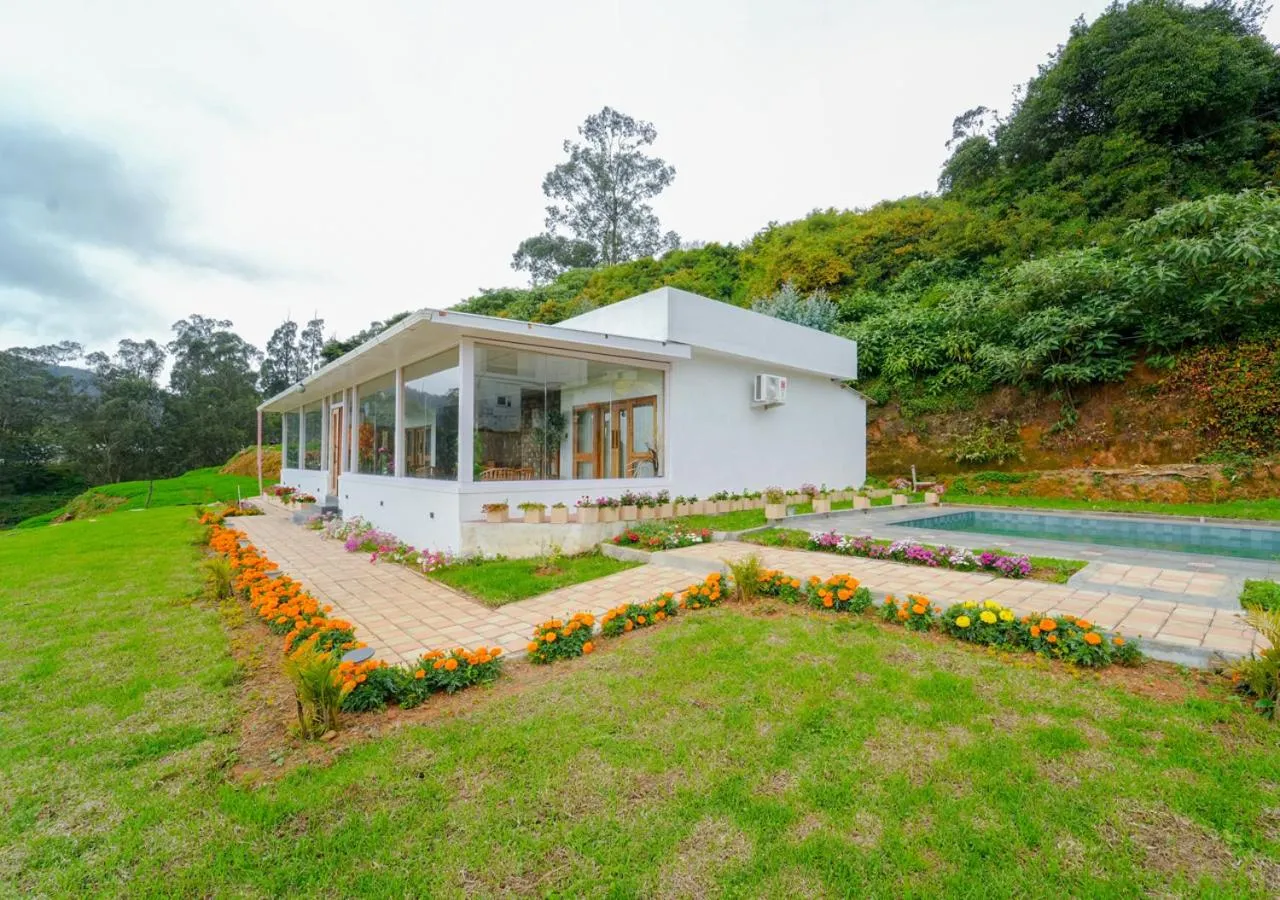 Property building in Silent Retreat Ooty Pool Resort by VOYE HOMES