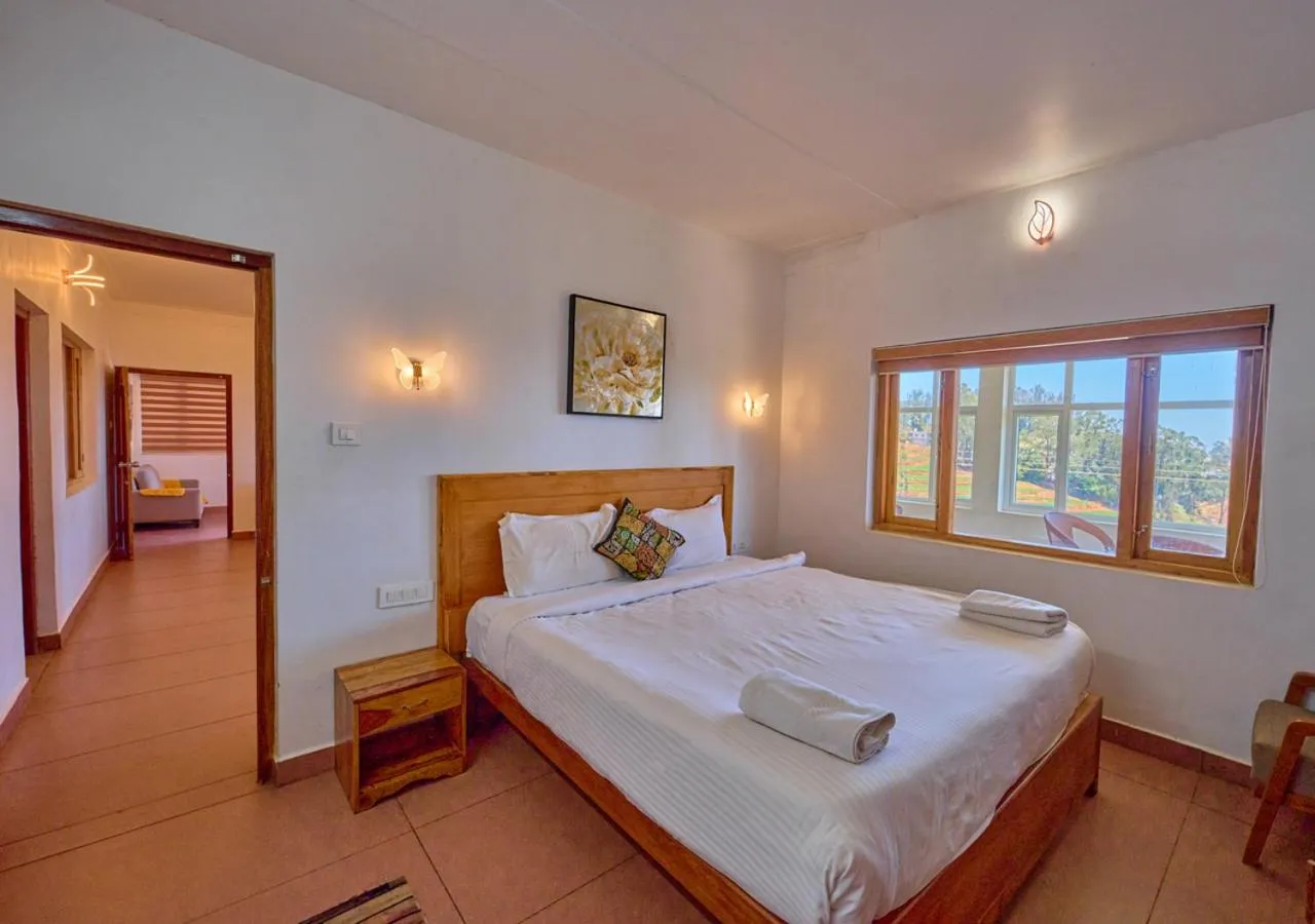 Bedroom, Bed in Silent Retreat Ooty Pool Resort by VOYE HOMES