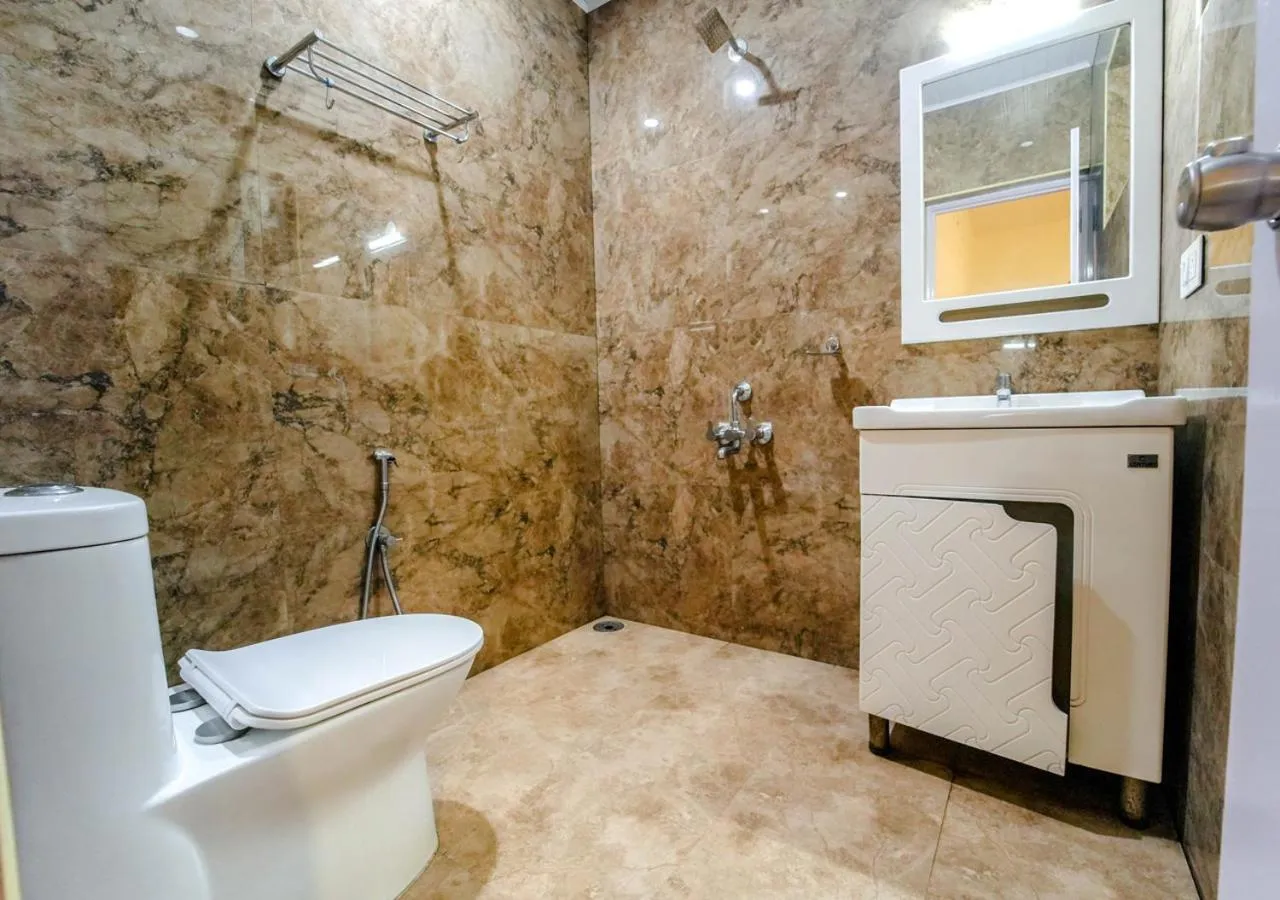 Toilet in Silent Retreat Ooty Pool Resort by VOYE HOMES