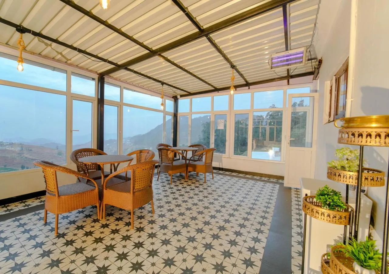 Restaurant/places to eat in Silent Retreat Ooty Pool Resort by VOYE HOMES