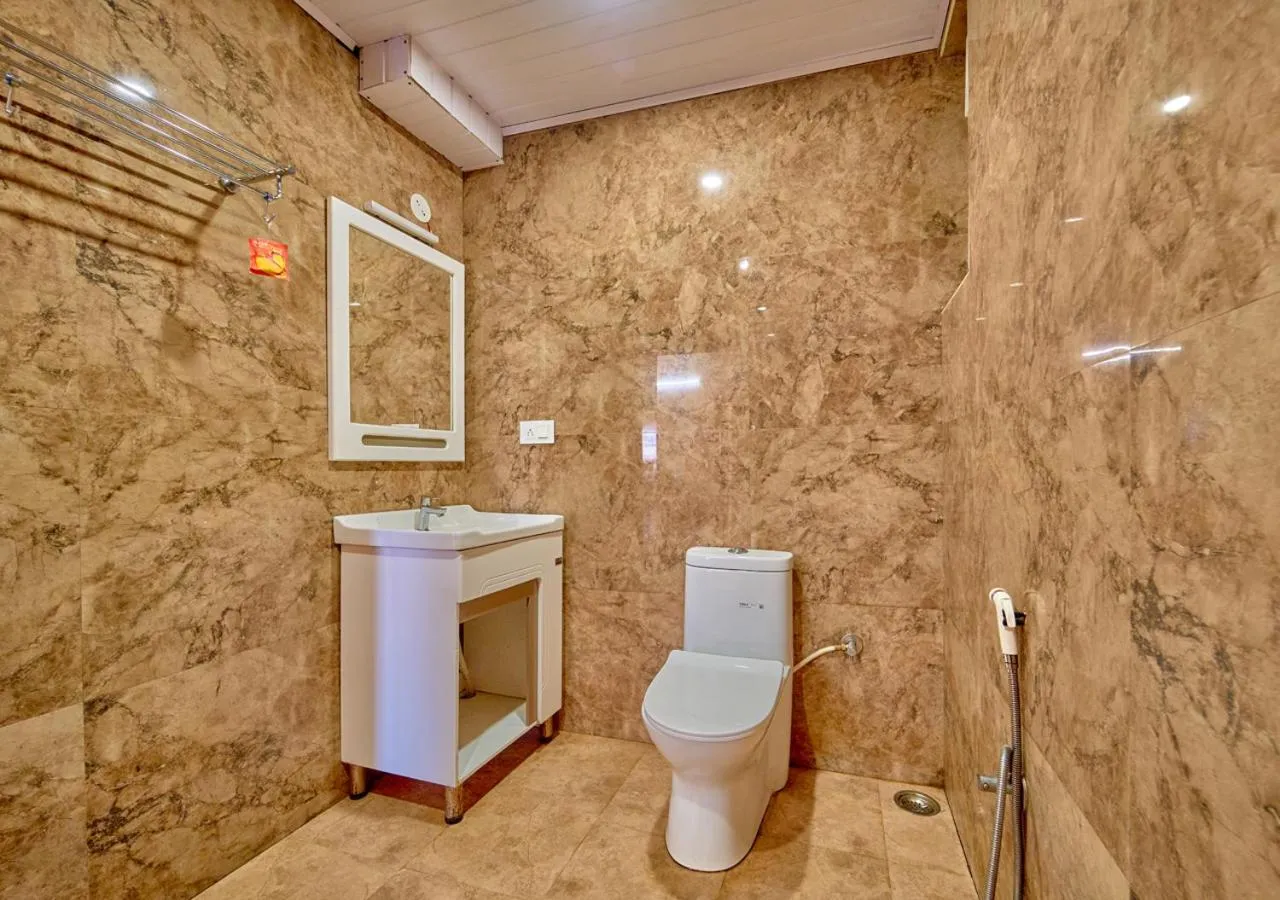 Shower in Silent Retreat Ooty Pool Resort by VOYE HOMES