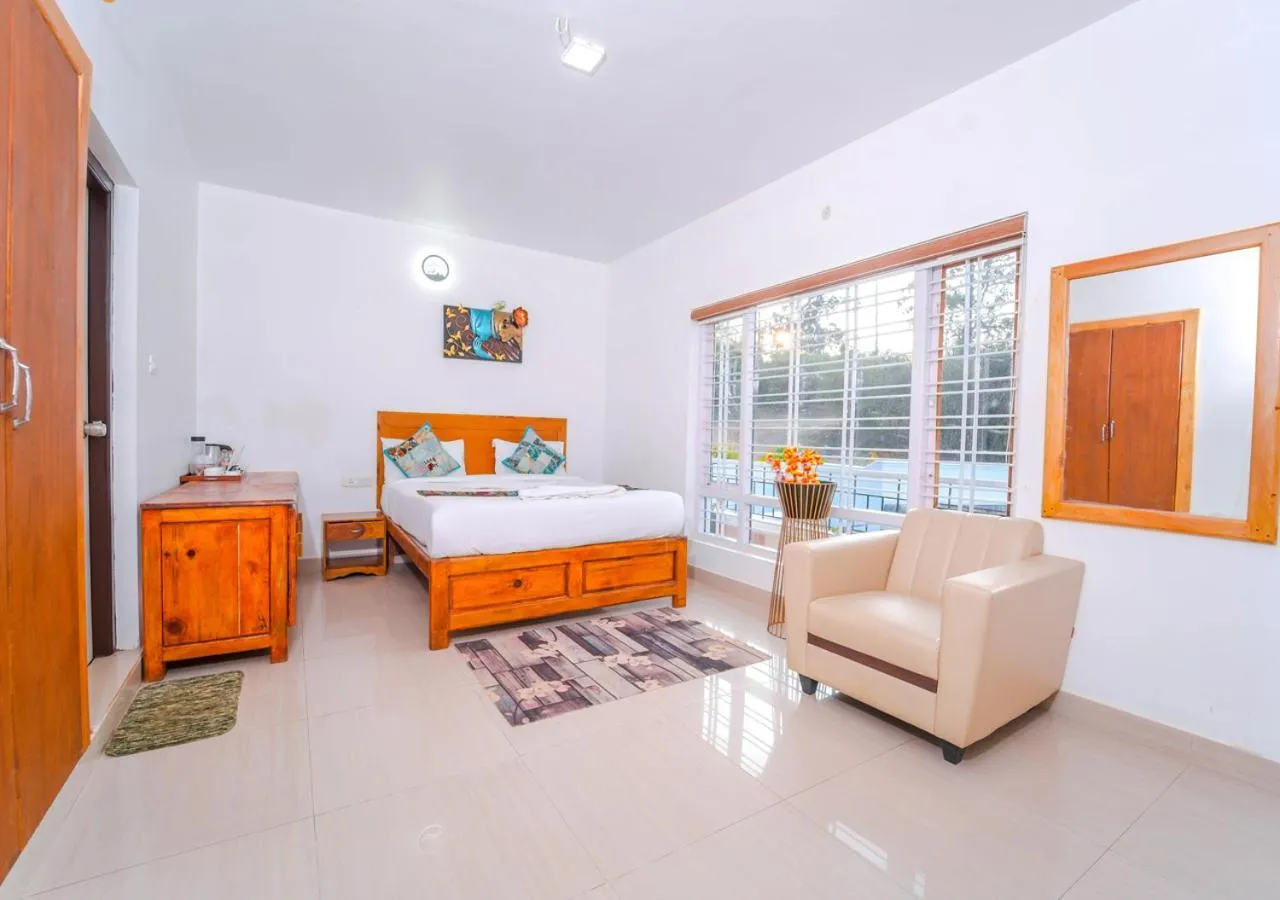 Bed in Silent Retreat Ooty Pool Resort by VOYE HOMES