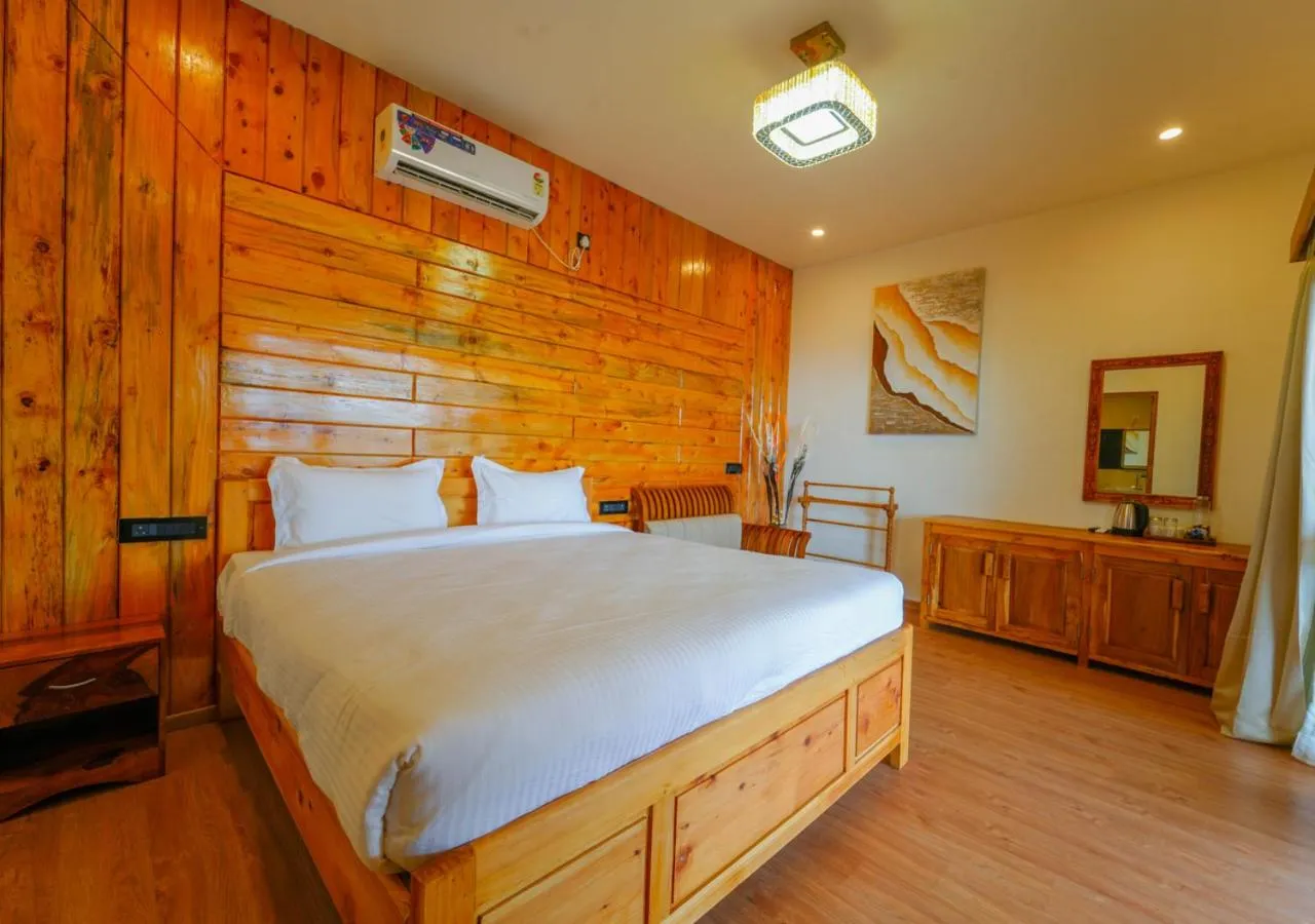 Bed in Silent Retreat Ooty Pool Resort by VOYE HOMES