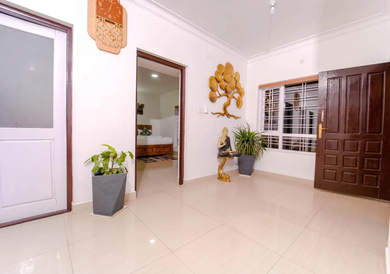 Living room in Silent Retreat Ooty Pool Resort by VOYE HOMES