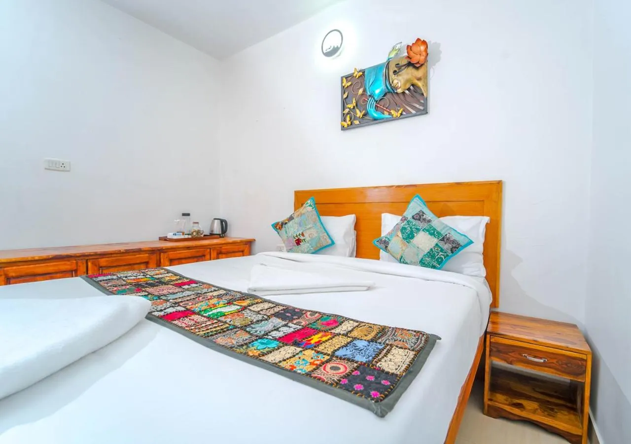 Bed in Silent Retreat Ooty Pool Resort by VOYE HOMES