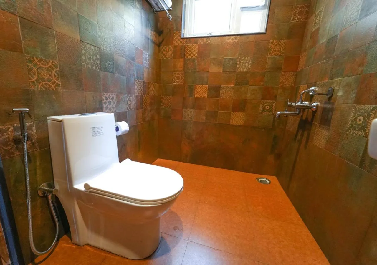 Shower in Silent Retreat Ooty Pool Resort by VOYE HOMES