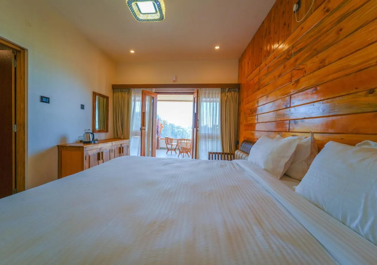 Bed in Silent Retreat Ooty Pool Resort by VOYE HOMES