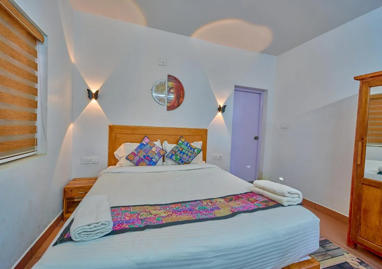 Photo of the whole room, Bed in Silent Retreat Ooty Pool Resort by VOYE HOMES